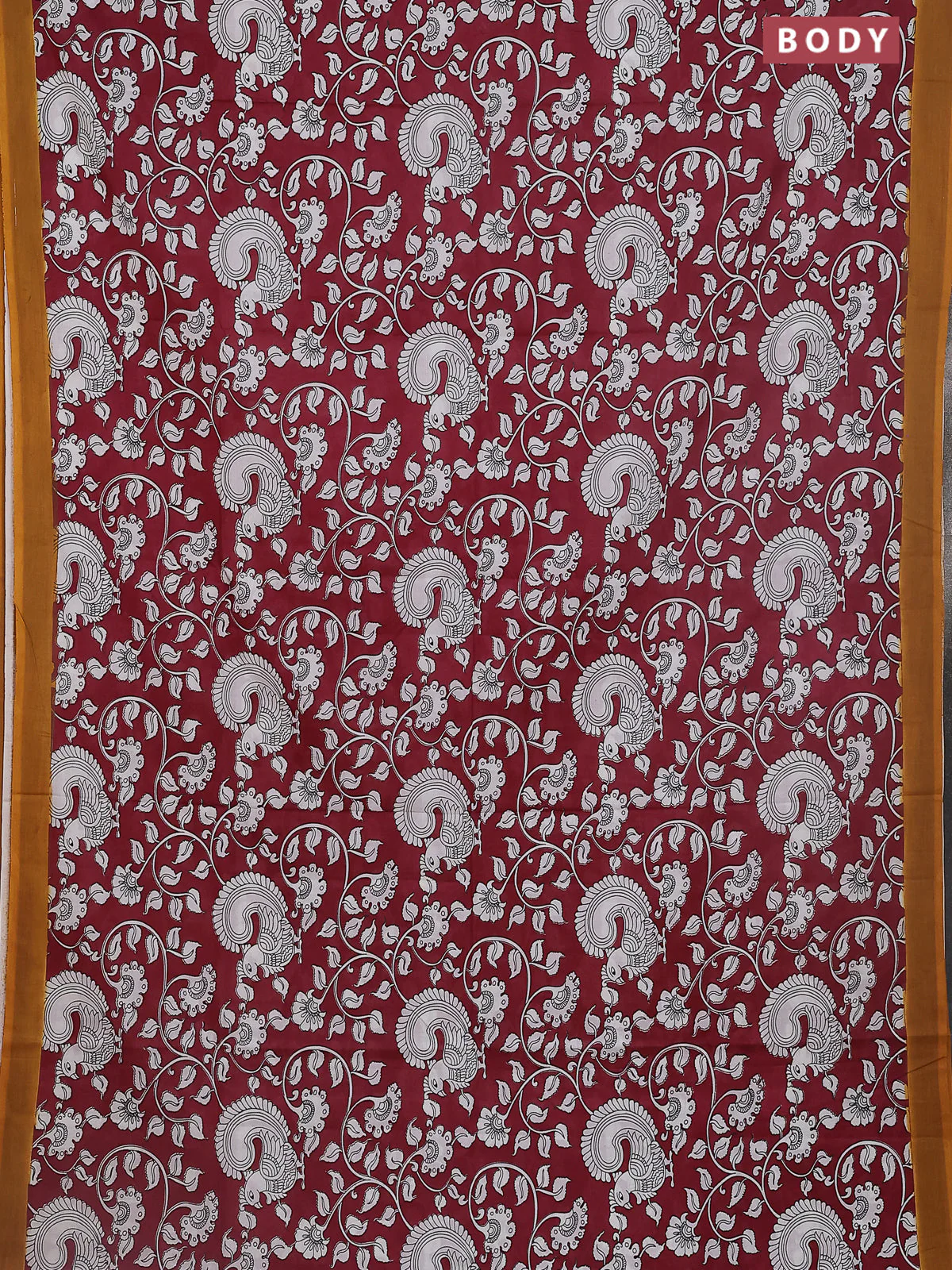 Kalamkari semi silk saree maroon and mustard yellow with allover prints and simple border - Image 2