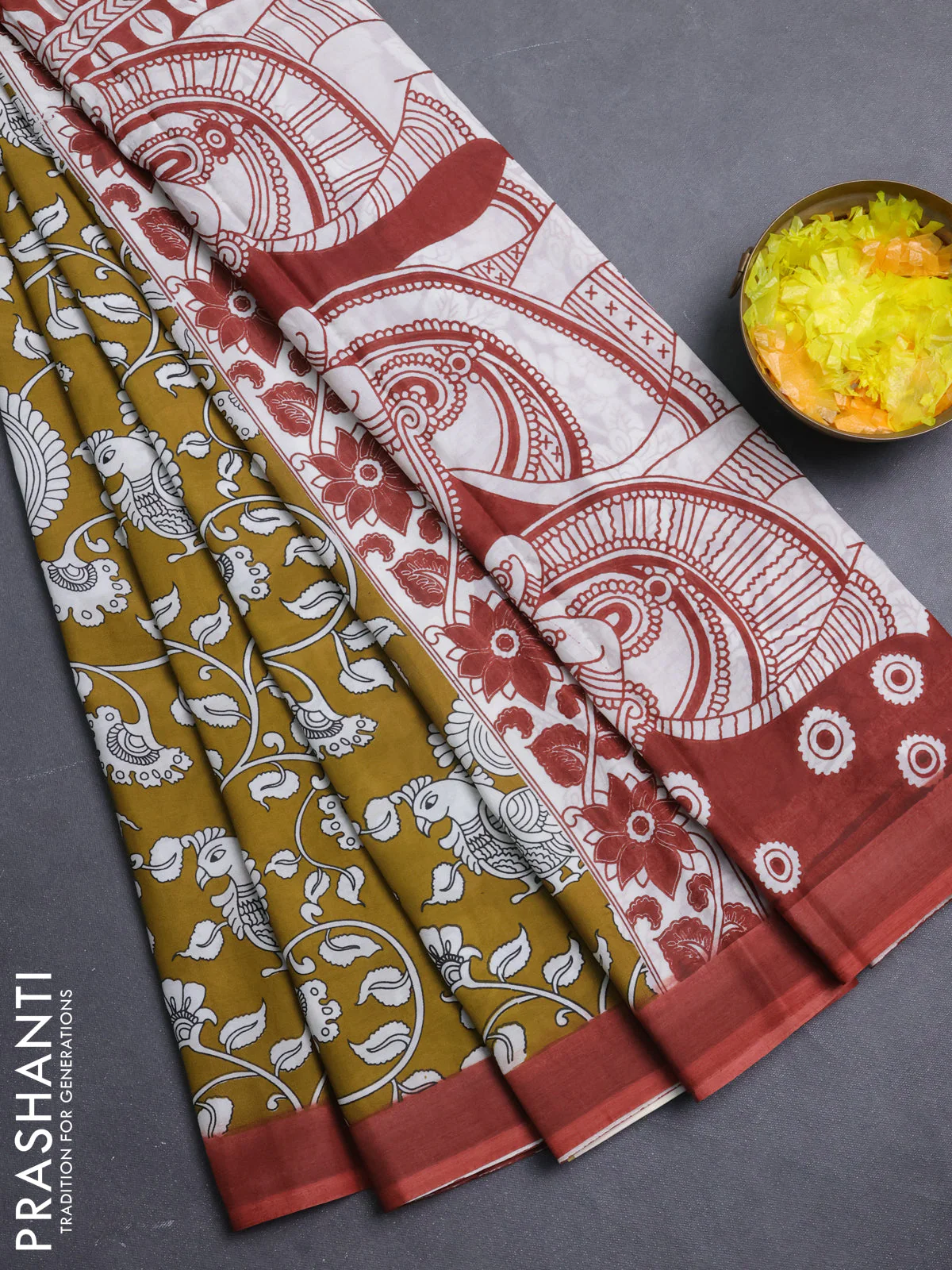 Kalamkari semi silk saree mustard yellow and rust shade with allover prints and simple border