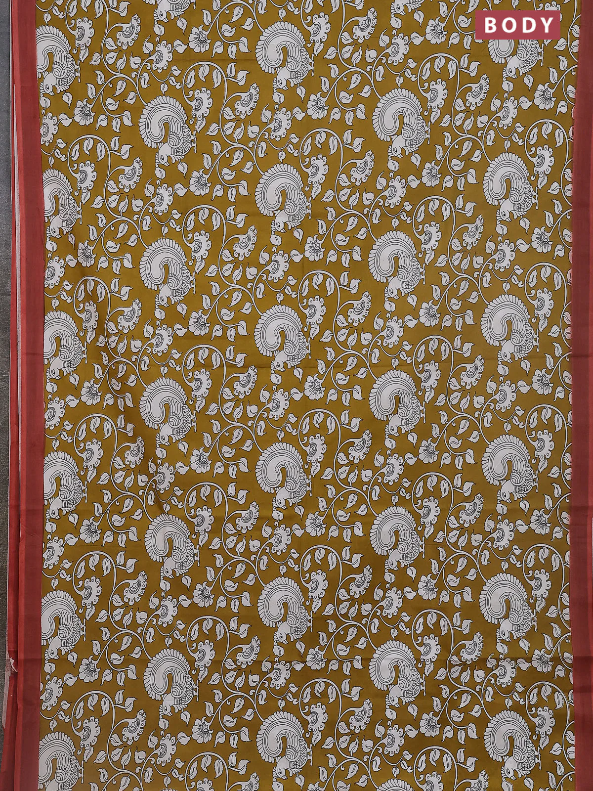Kalamkari semi silk saree mustard yellow and rust shade with allover prints and simple border - Image 2