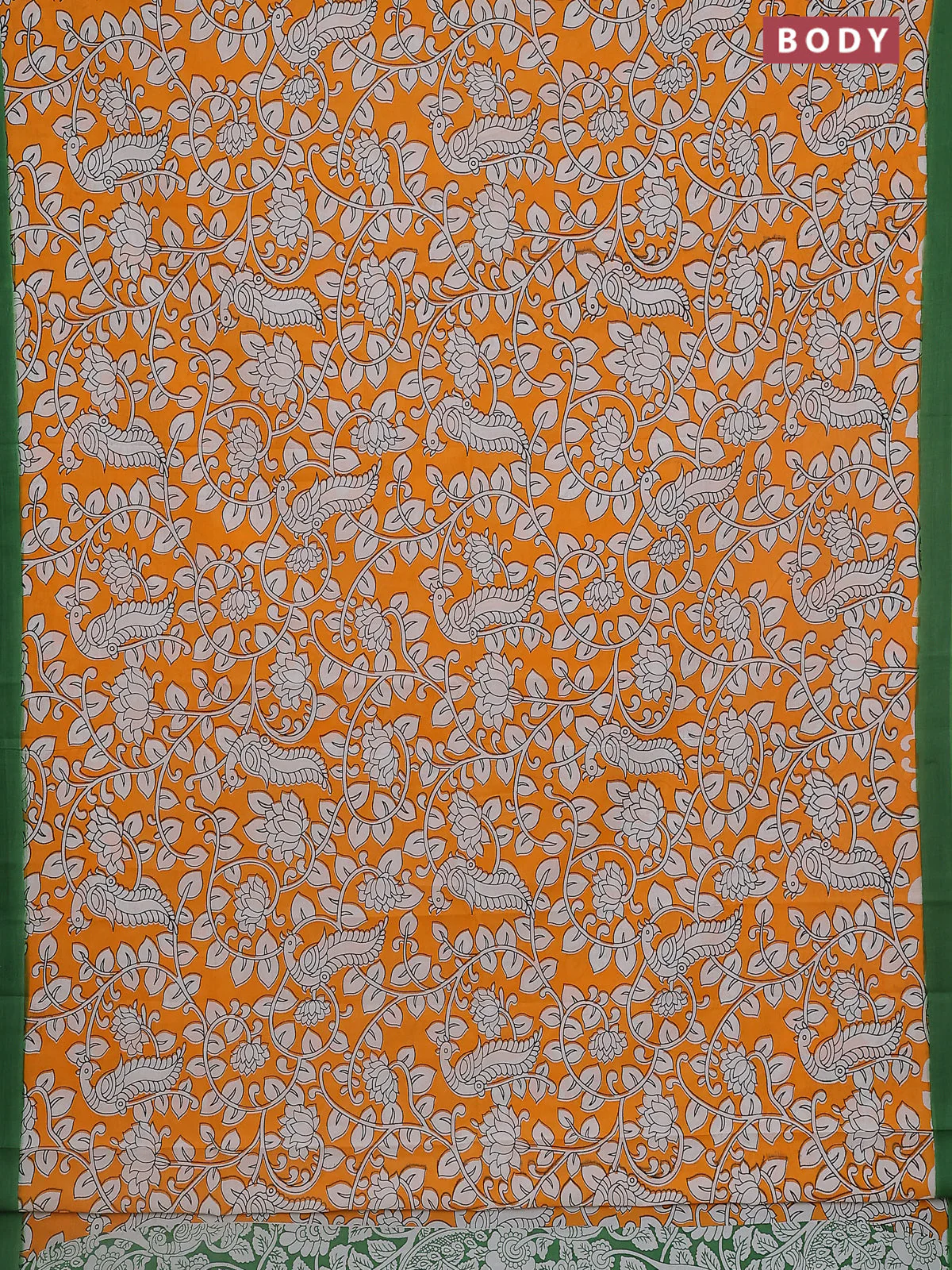 Kalamkari semi silk saree orange and green with allover prints and simple border - Image 2