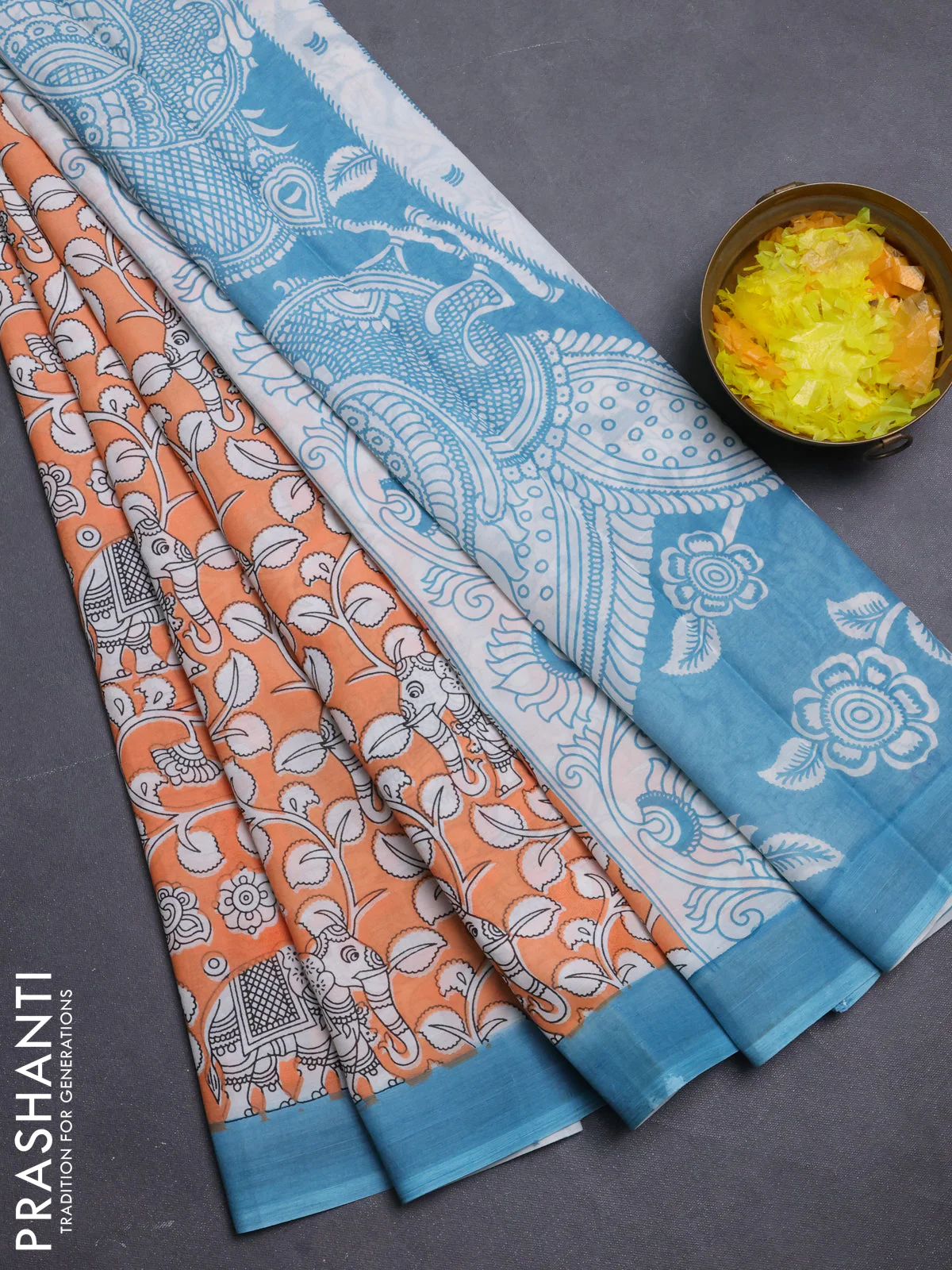 Kalamkari semi silk saree orange and teal blue with allover prints and simple border