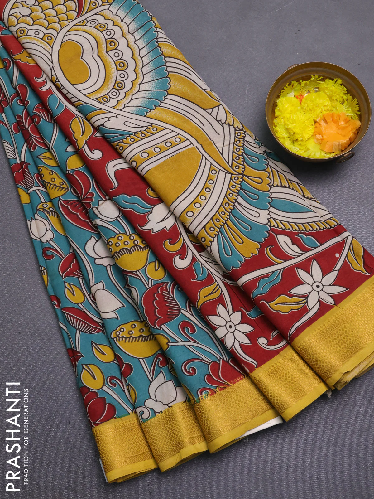 Kalamkari semi silk saree teal green and lime yellow with allover prints and mangalgiri border