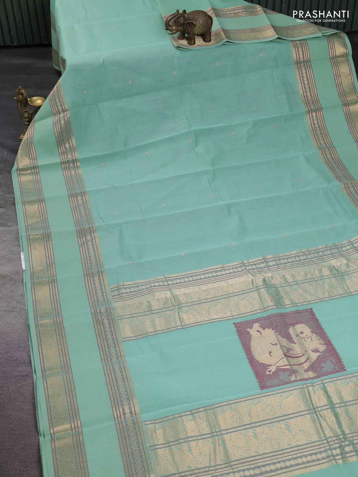 Kanchi cotton saree pastel green with plain body and rettapet zari woven butta border - Image 2