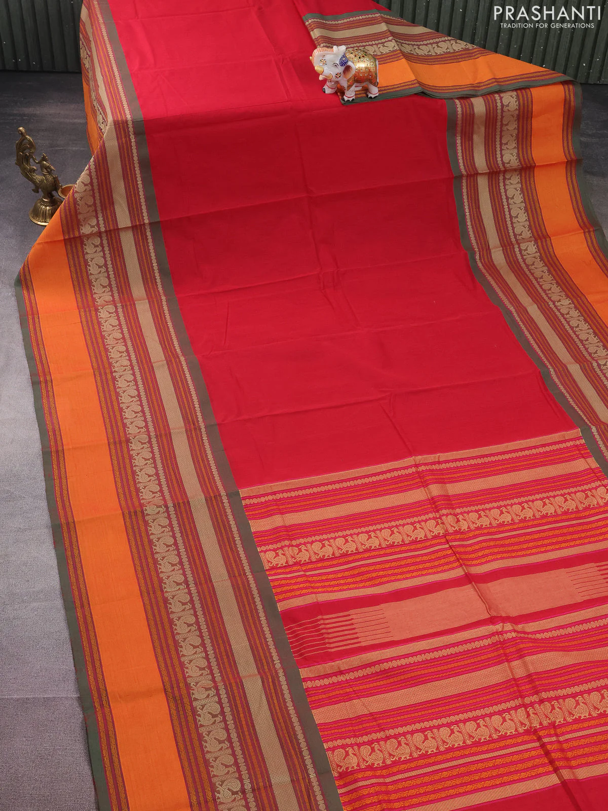 Kanchi cotton saree red and green with plain body and long thread woven border - Image 2