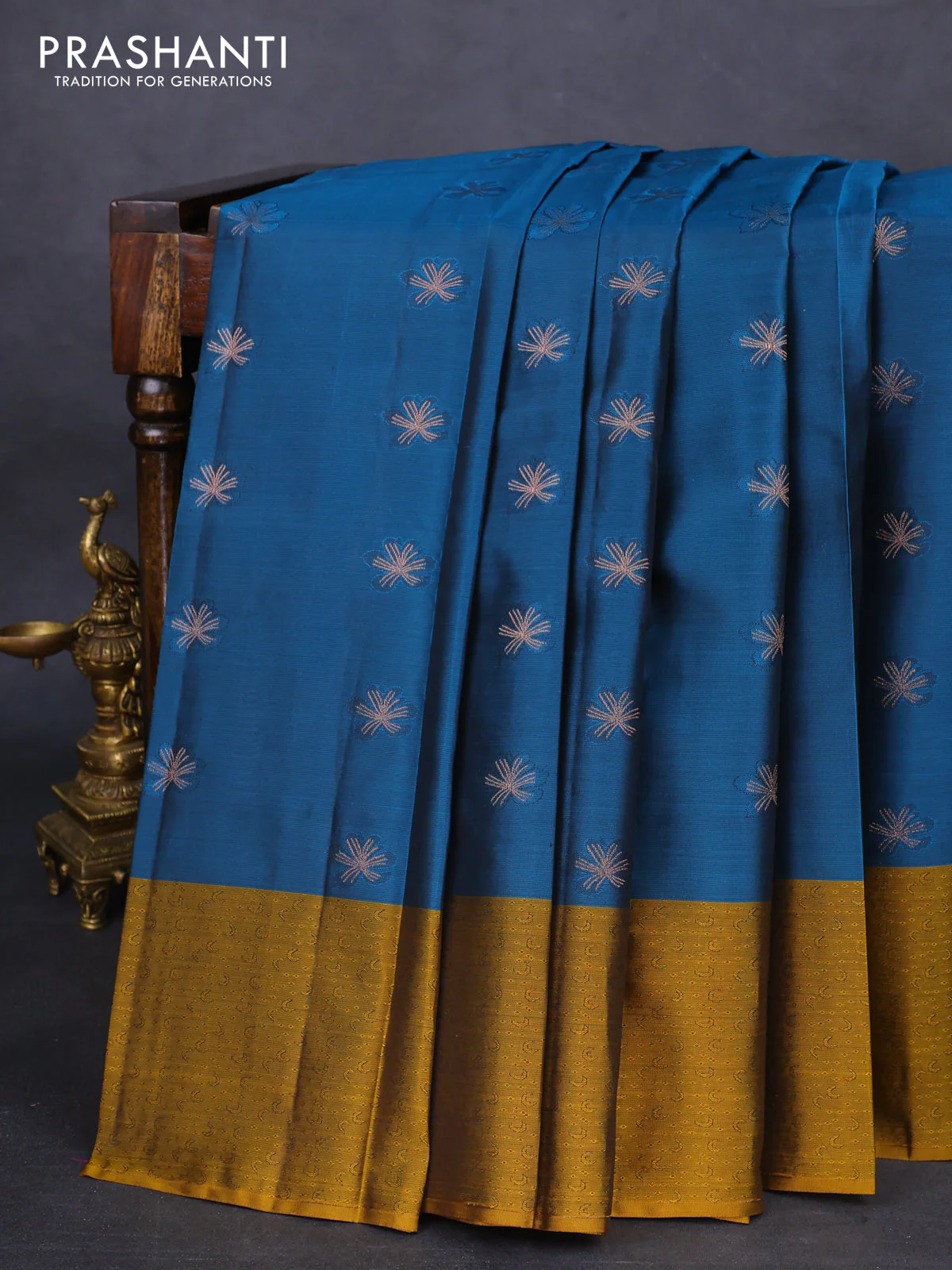 Kanchipuram silk saree peacock green and mustard shade with zari woven buttas and self emboss border