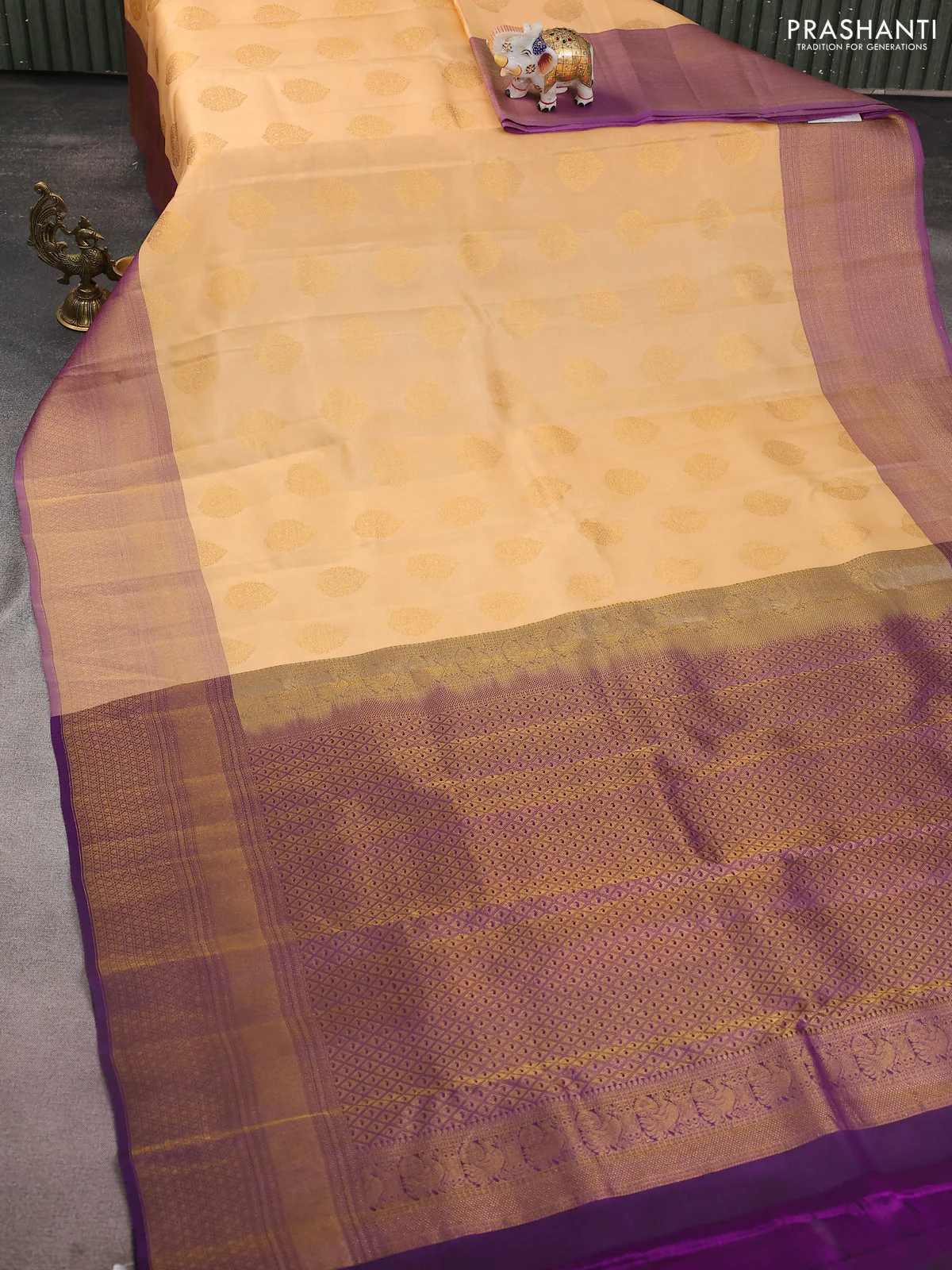Kanchipuram silk saree sandal and dual shade of purple wuith zari woven buttas and long zari woven border - Image 2