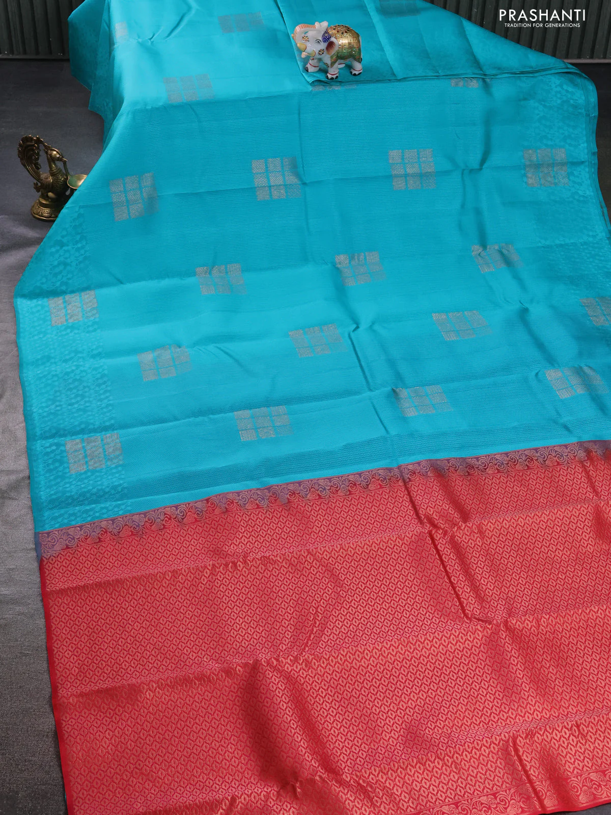 Kanchipuram silk saree teal blue and dual shade of pinkish orange with allover self emboss and zari butta border - Image 2