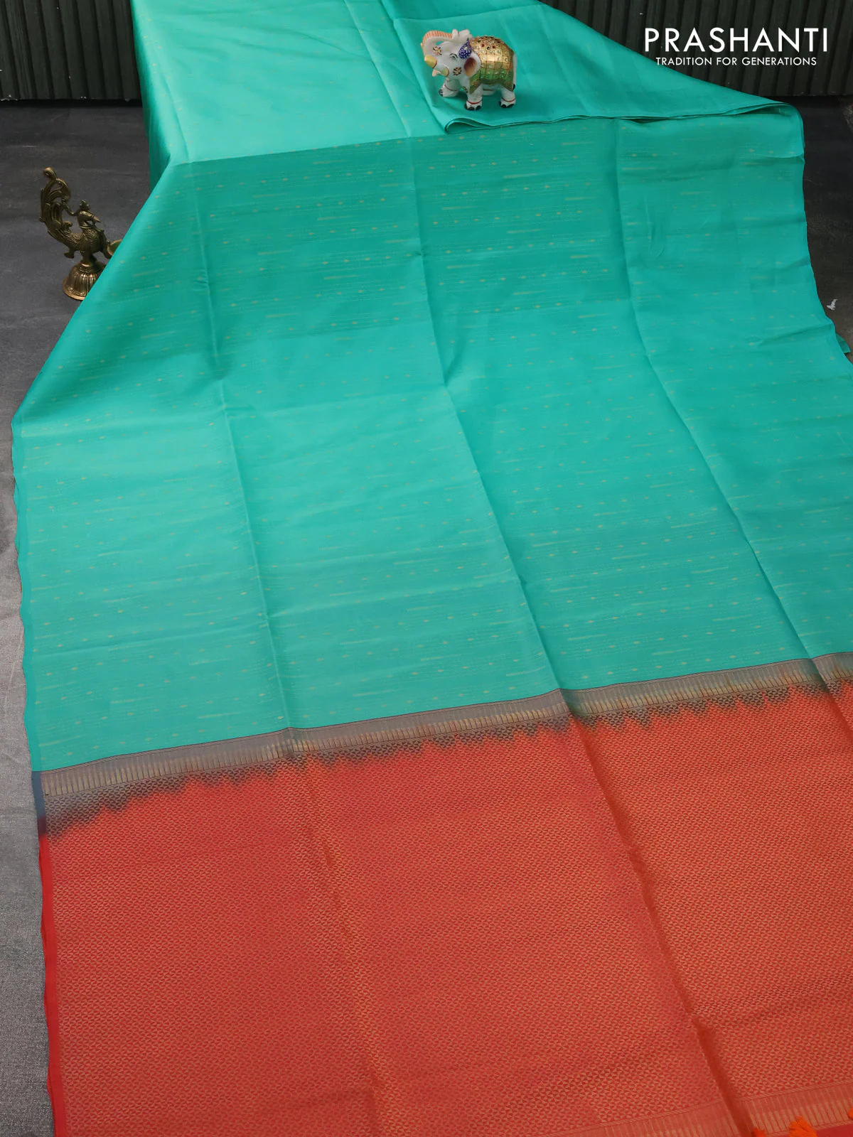 Kanchipuram silk saree teal green shade and dual shade of orange with allover zari weaves in borderless style - Image 2