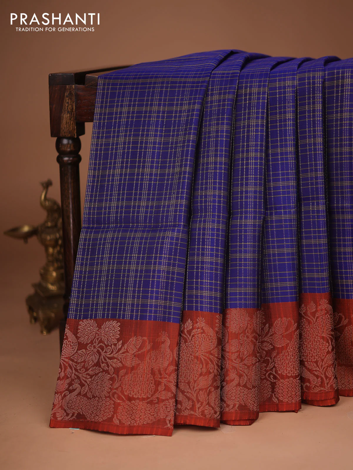 Kanchipuram soft silk saree blue and rustic orange with allover zari woven checked pattern and peacock design zari woven border
