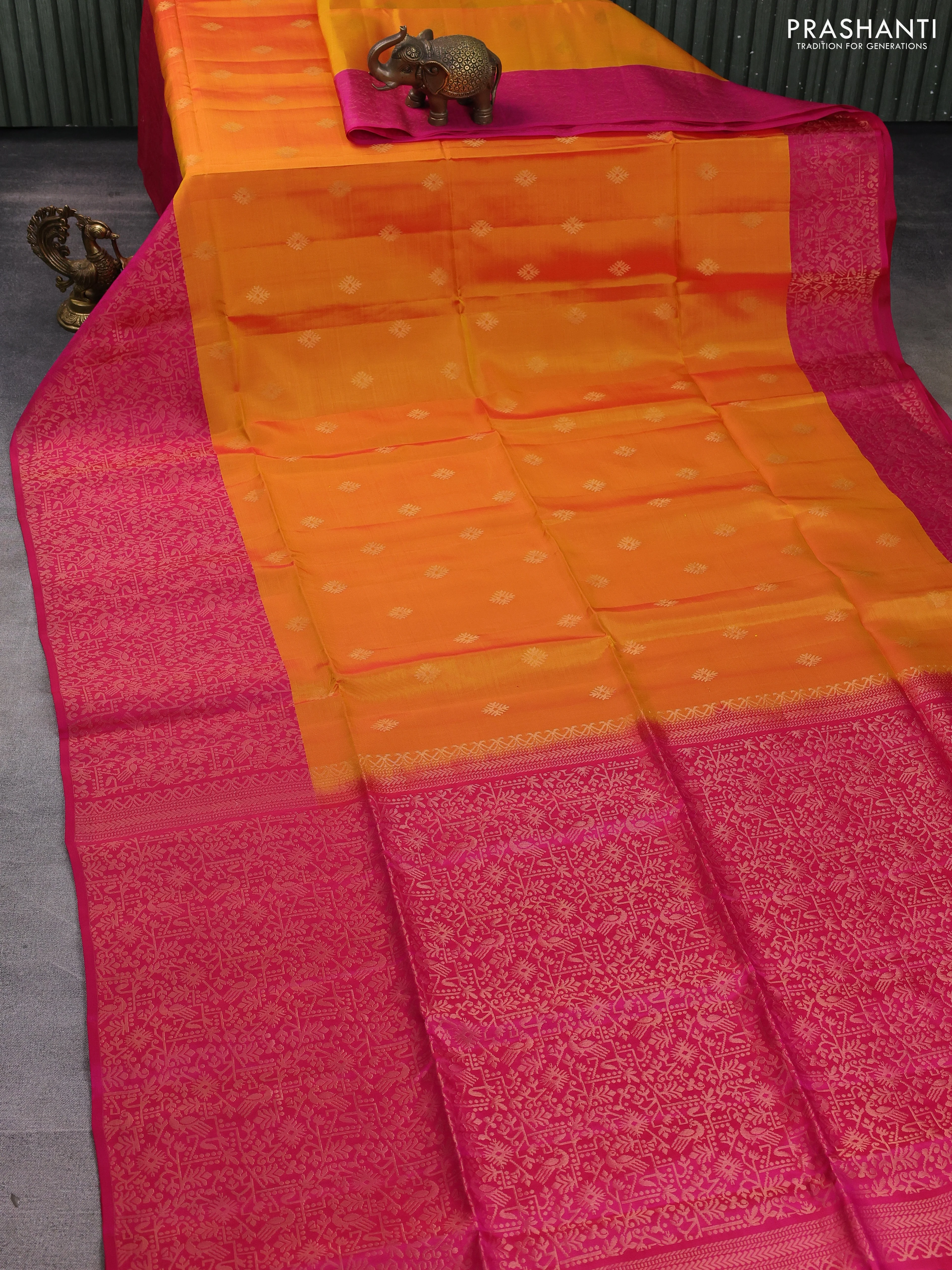 Kanchipuram soft silk saree orange and dark pink with allover zari woven buttas and long zari woven border - Image 2