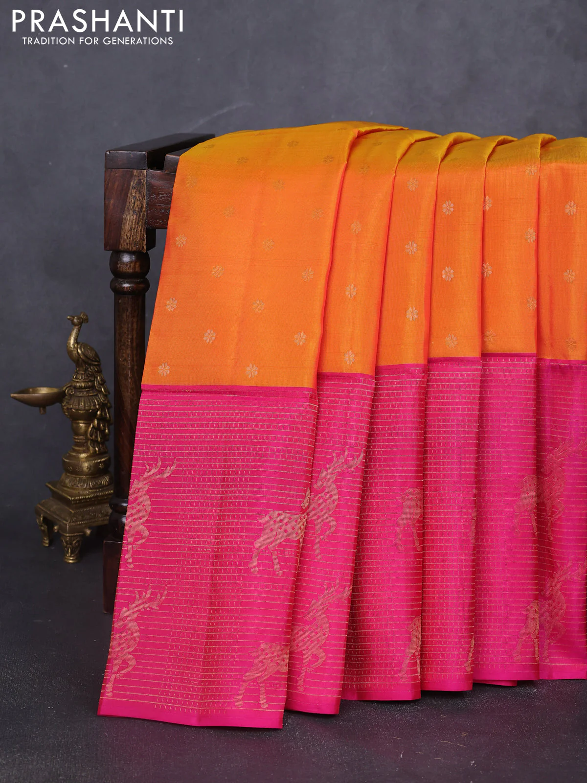 Kanchipuram soft silk saree orange and pink with allover zari woven buttas and long zari woven border