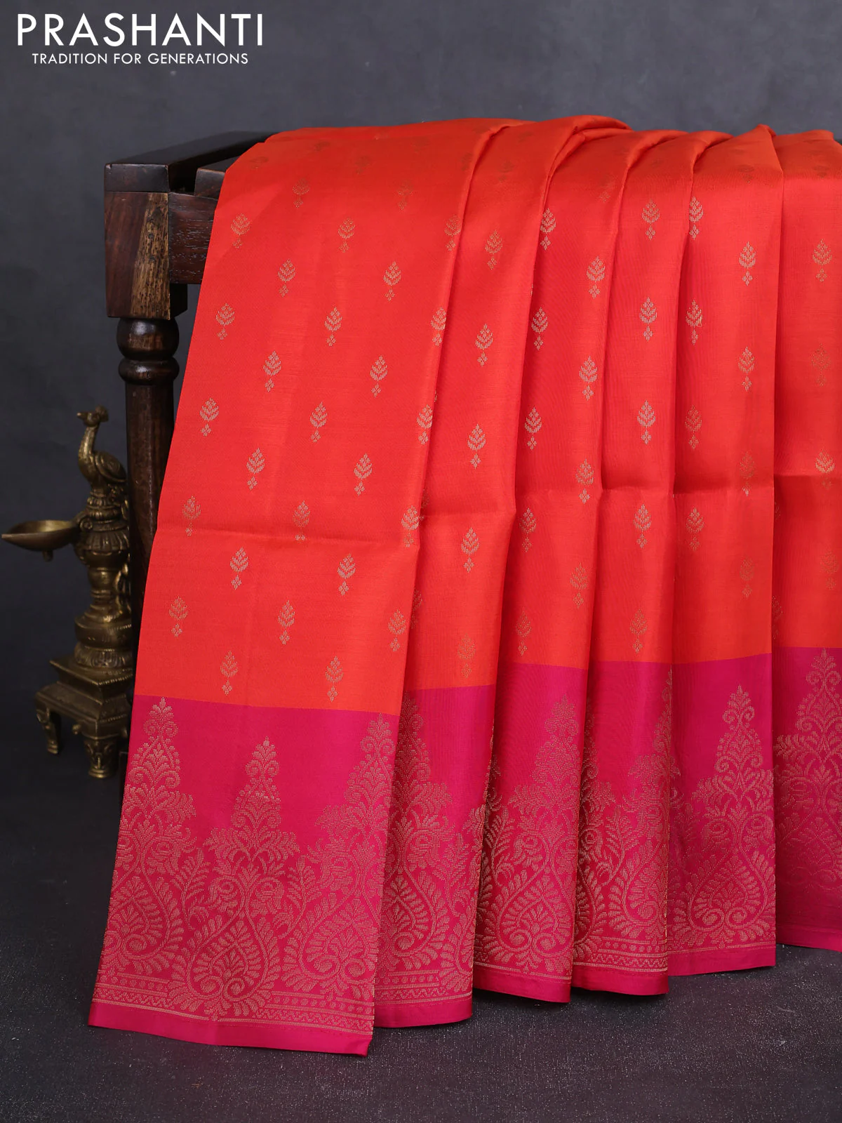 Kanchipuram soft silk saree orange and pink with allover zari woven buttas and long zari woven border