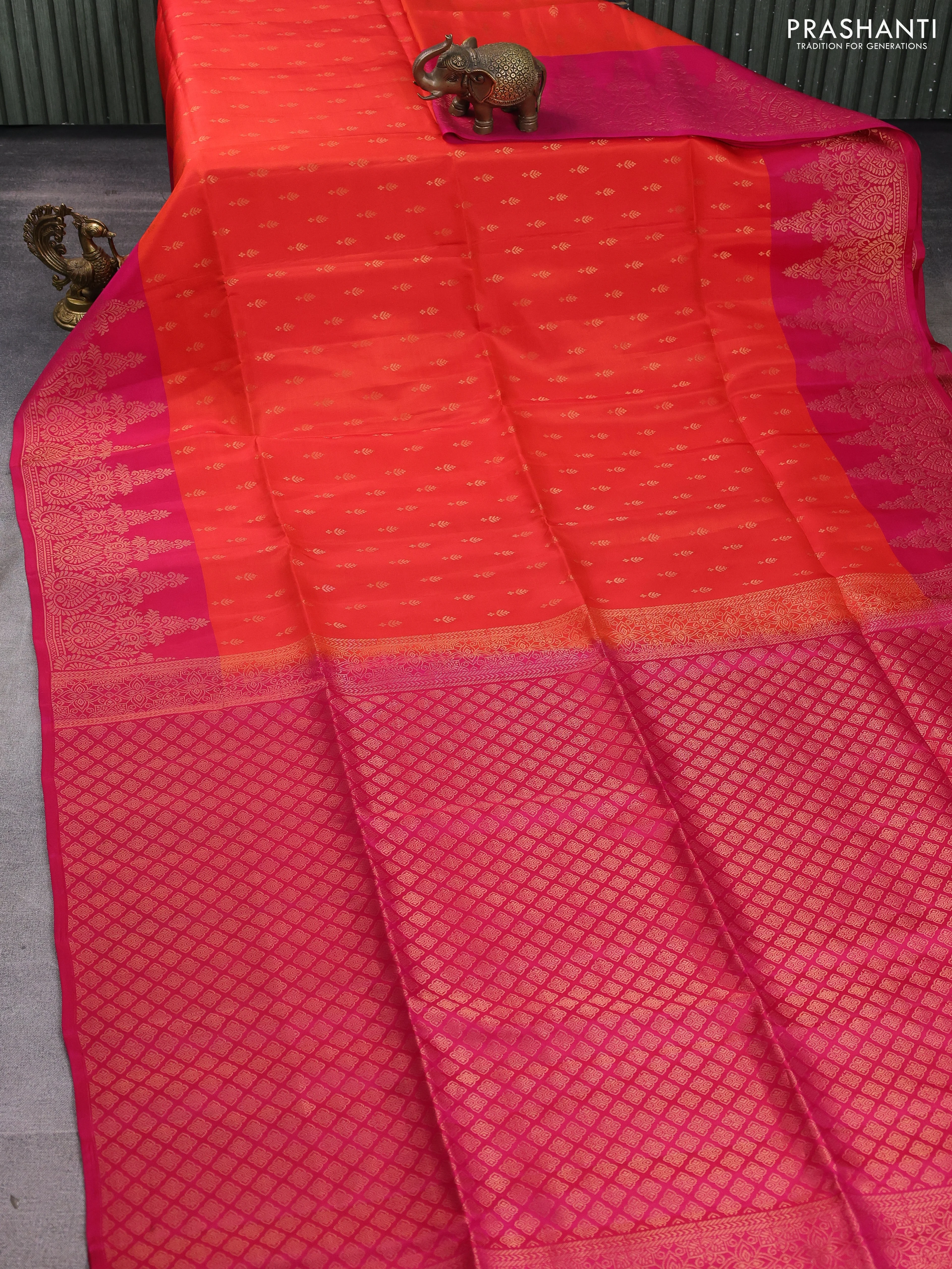 Kanchipuram soft silk saree orange and pink with allover zari woven buttas and long zari woven border - Image 2