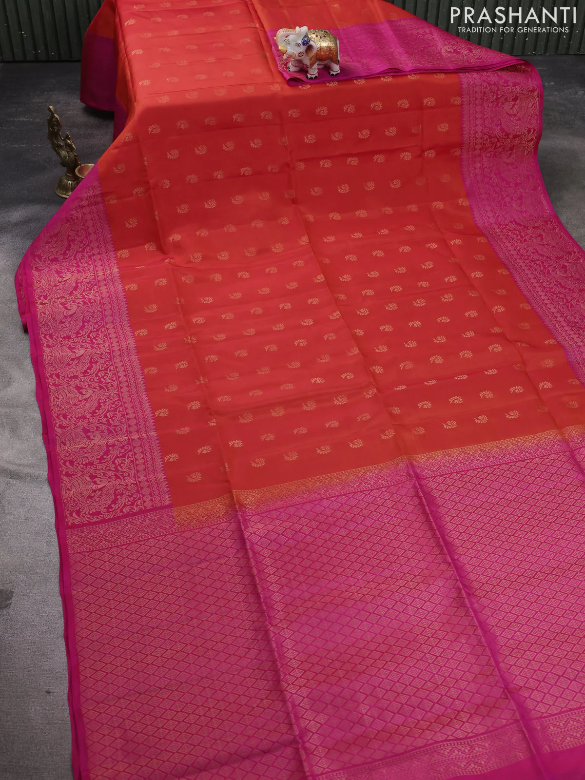 Kanchipuram soft silk saree orange and pink with allover zari woven buttas and long zari woven border - Image 2