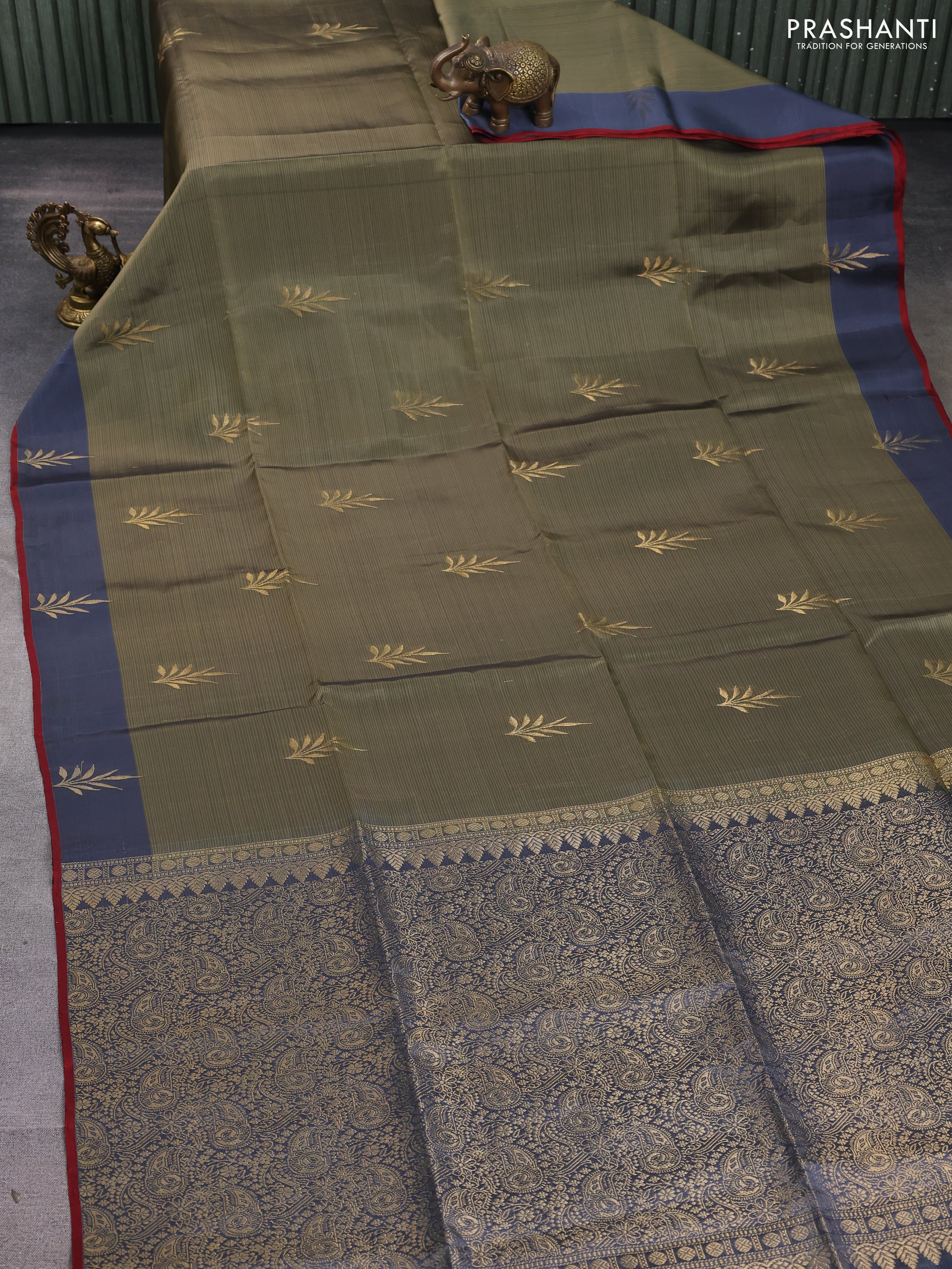 Kanchipuram soft silk saree pastel green and grey with zari woven buttas and zari woven butta border - Image 2