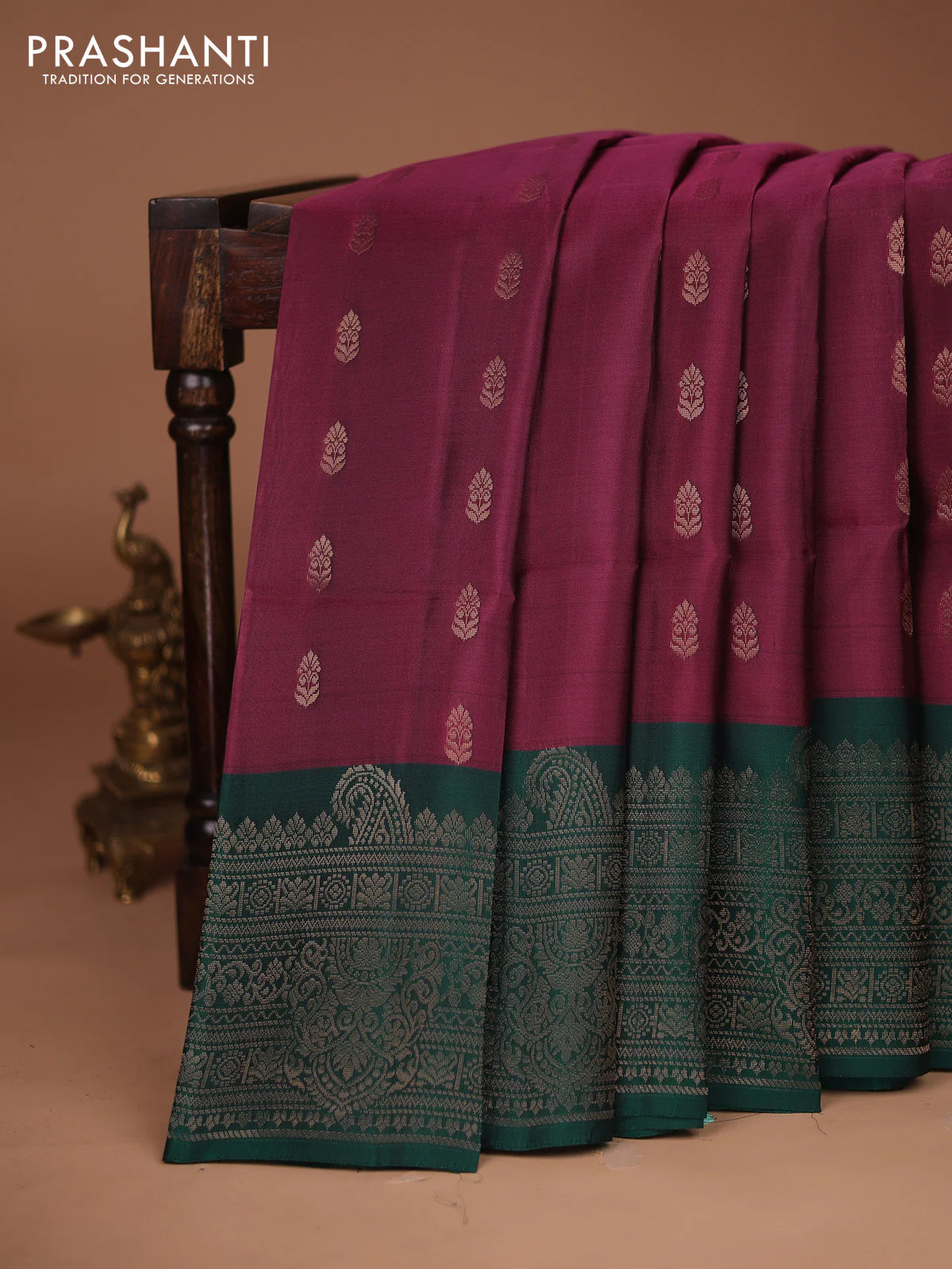 Kanchipuram soft silk saree wine shade and peacock green with allover zari woven buttas and long zari woven border