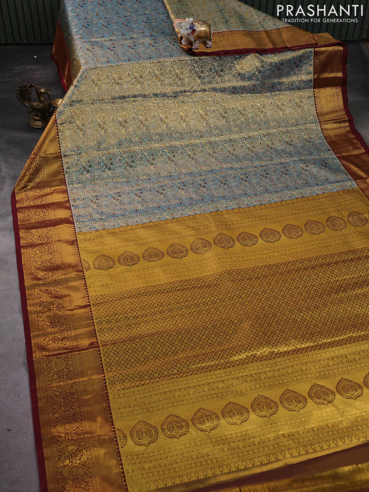 Kanchipuram tissue silk saree dual shade of blue shade and maroon with allover zari woven brocade weaves and zari woven border - Image 2