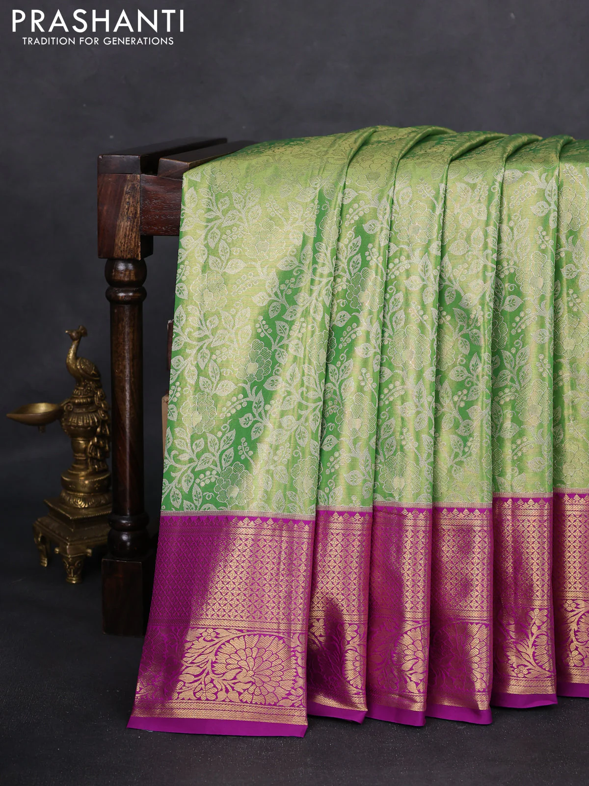 Kanchipuram tissue silk saree light green and purple with allover zari woven brocade weaves and zari woven border