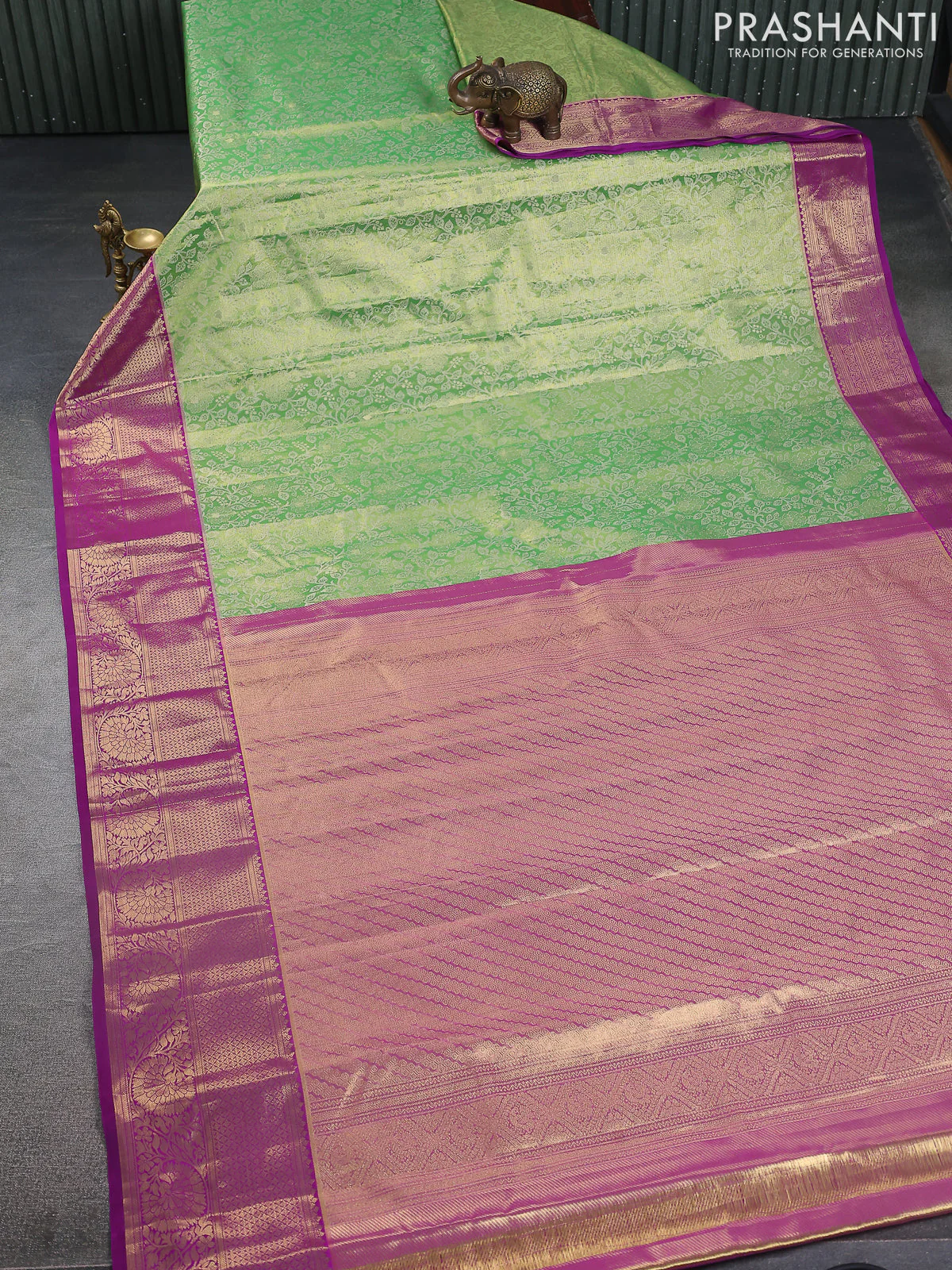 Kanchipuram tissue silk saree light green and purple with allover zari woven brocade weaves and zari woven border - Image 2