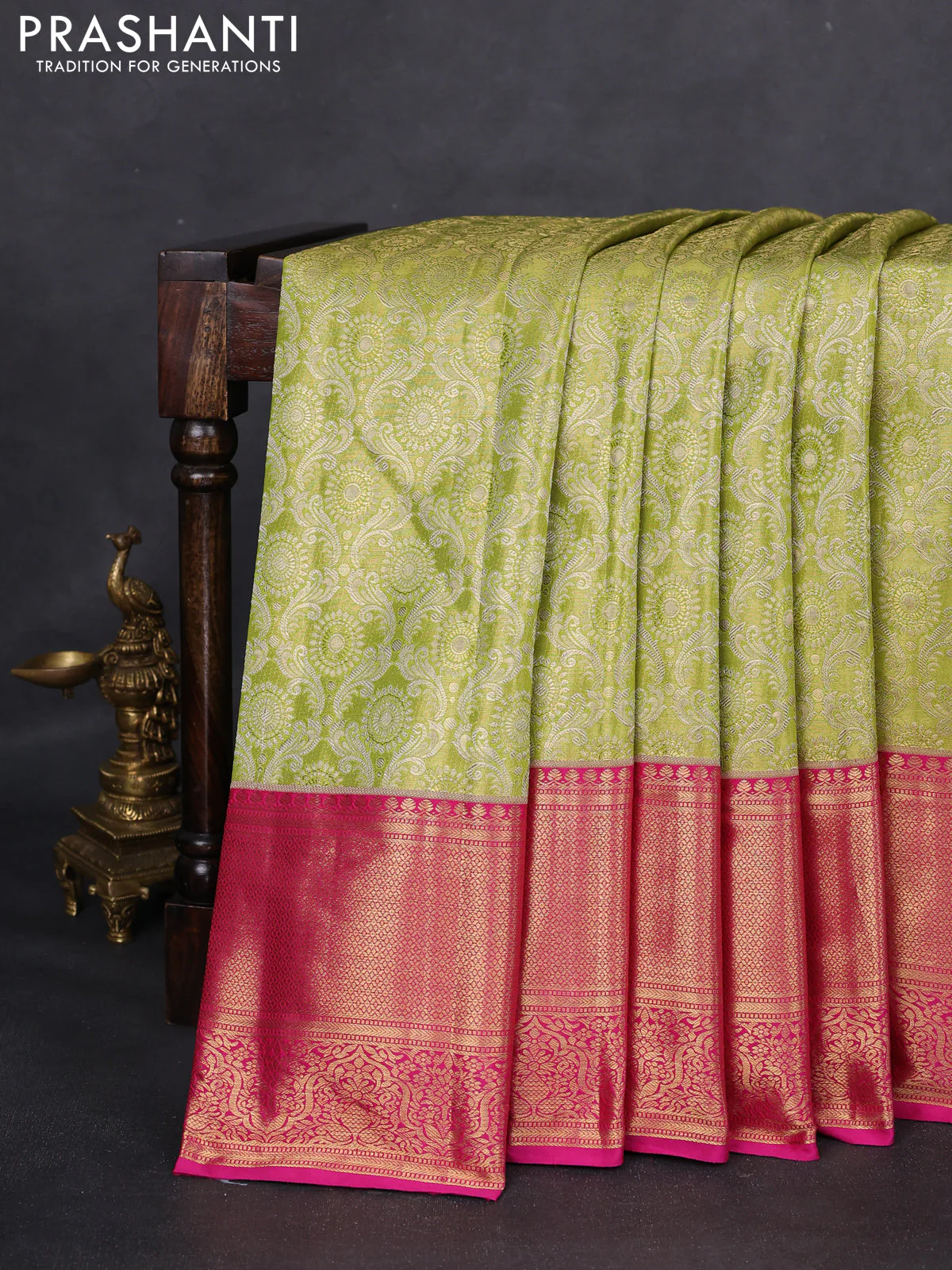 Kanchipuram tissue silk saree lime green and pink with allover zari woven brocade weaves and zari woven border