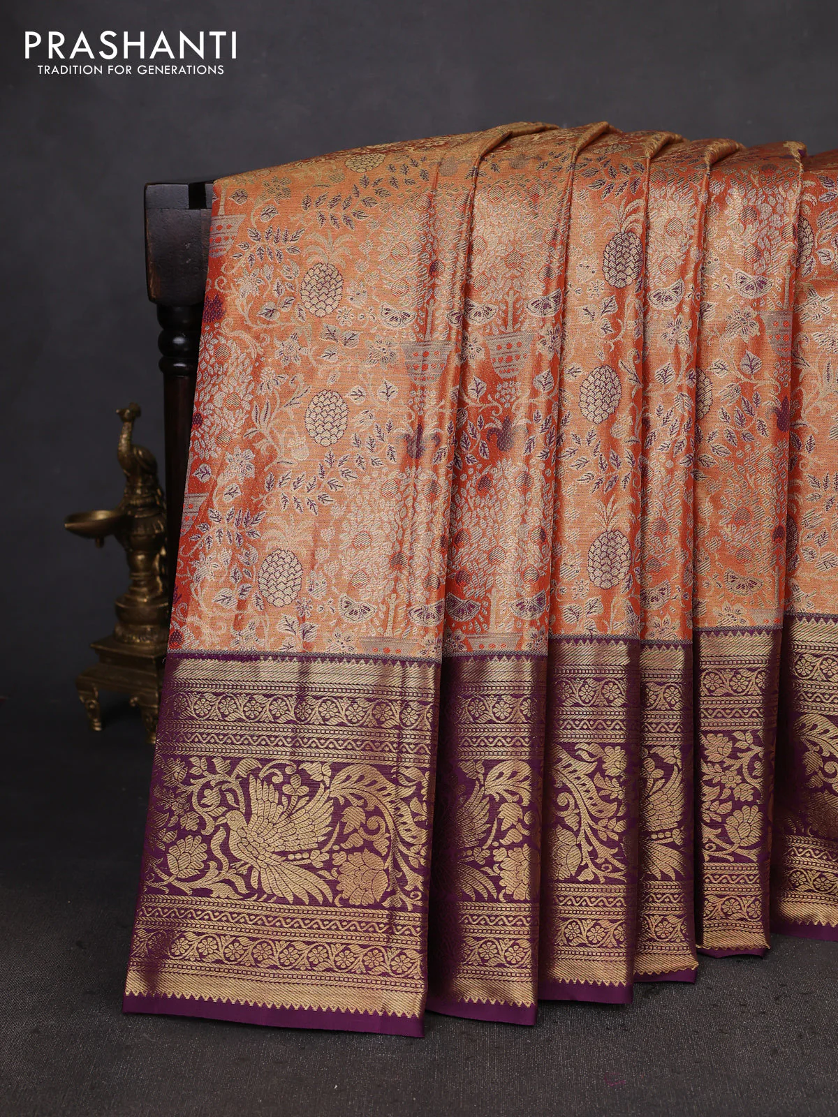 Kanchipuram tissue silk saree orange and deep purple with allover zari woven brocade weaves and long zari woven border