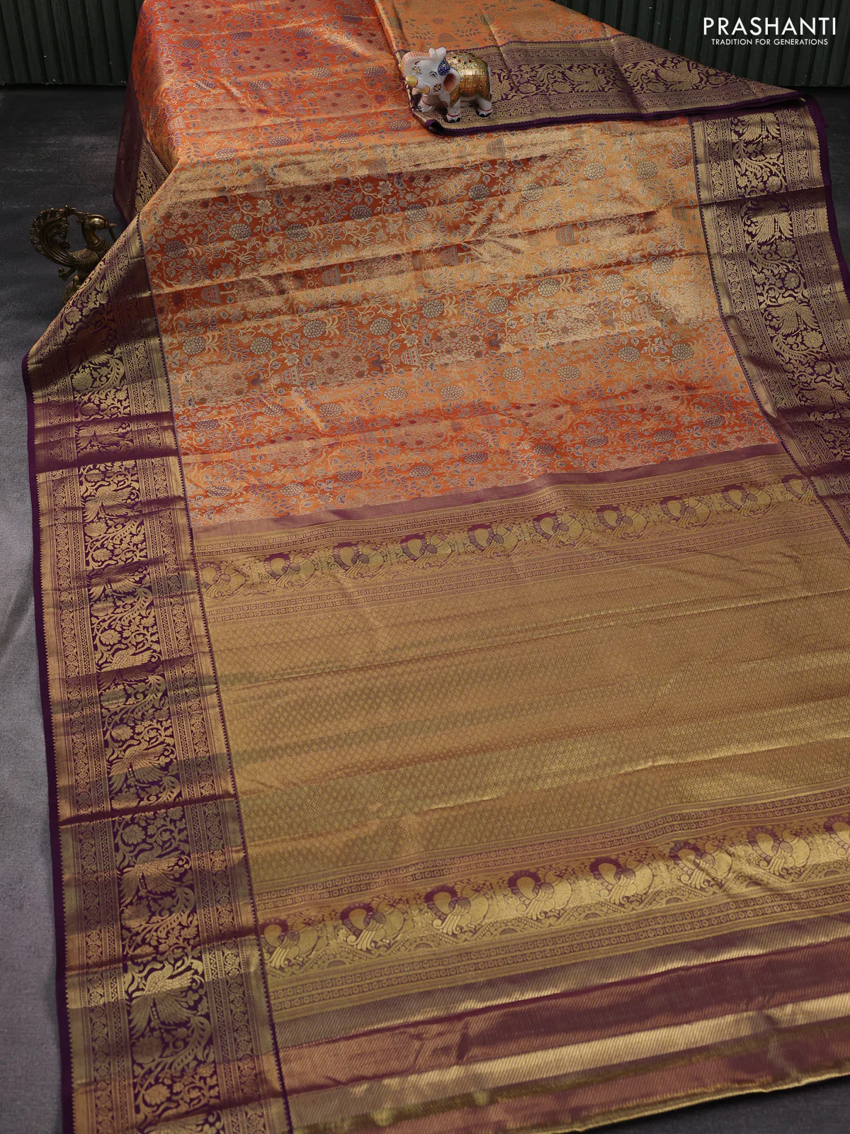 Kanchipuram tissue silk saree orange and deep purple with allover zari woven brocade weaves and long zari woven border - Image 2