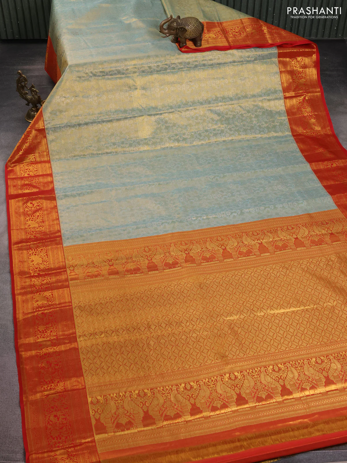 Kanchipuram tissue silk saree pastel blue and red with allover zari woven brocade weaves and zari woven border - Image 2