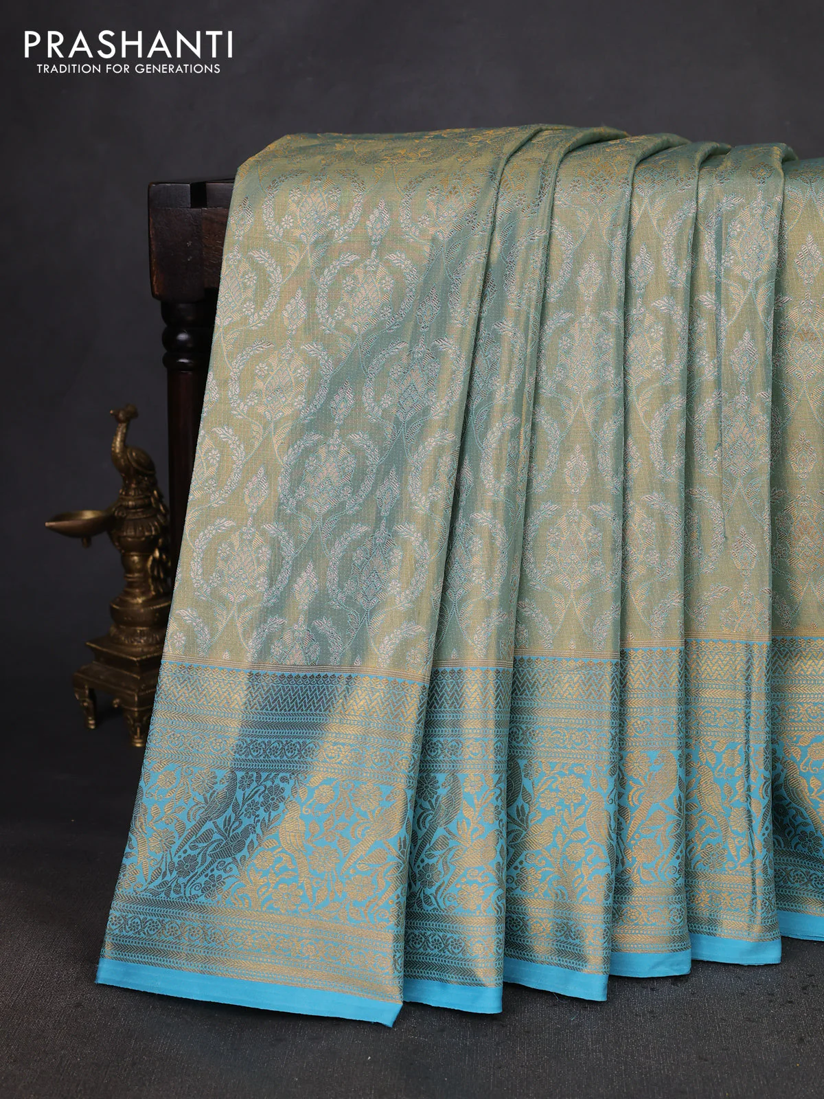 Kanchipuram tissue silk saree pastel blue and teal blue with allover zari woven brocade weaves and zari woven border