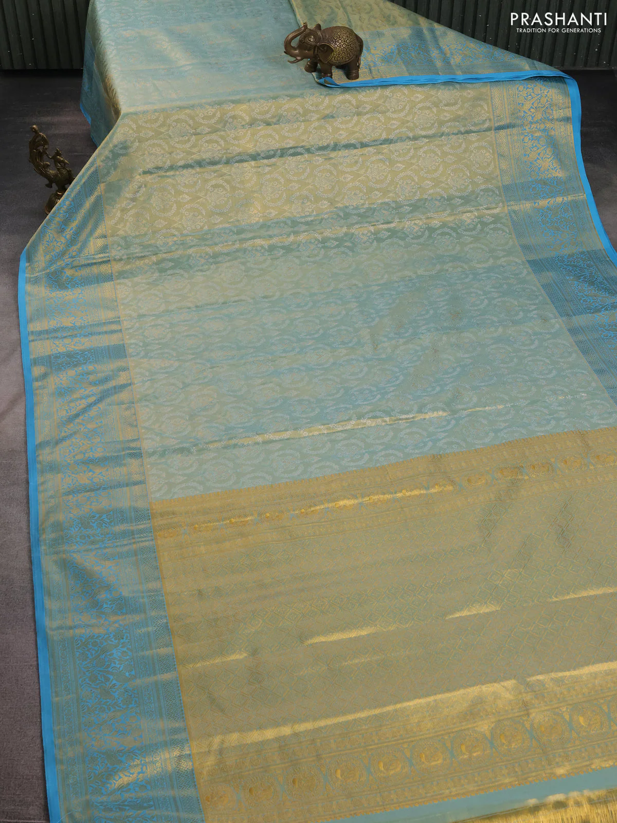 Kanchipuram tissue silk saree pastel blue and teal blue with allover zari woven brocade weaves and zari woven border - Image 2