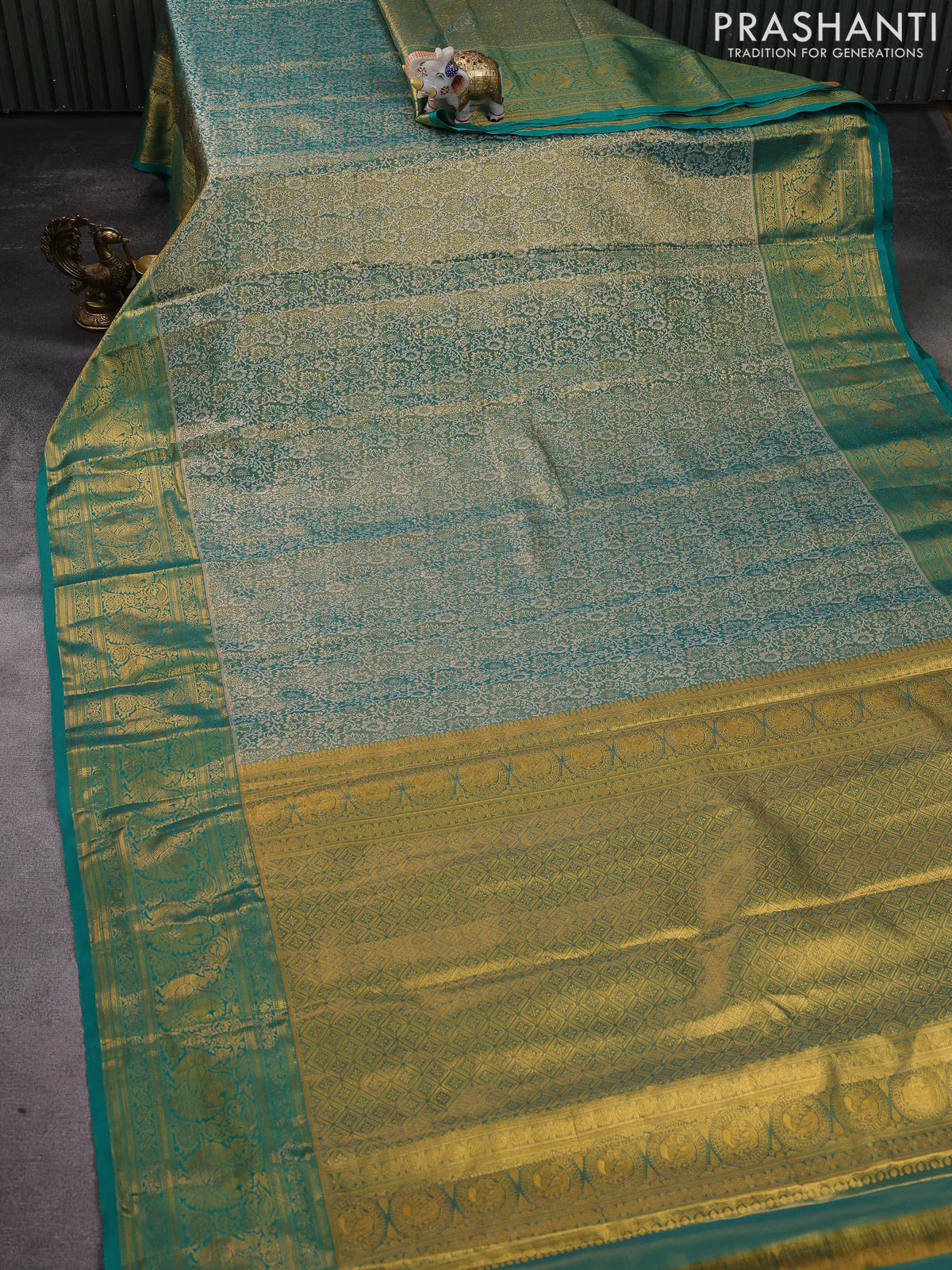 Kanchipuram tissue silk saree teal green with allover zari woven brocade weaves and zari woven border - Image 2