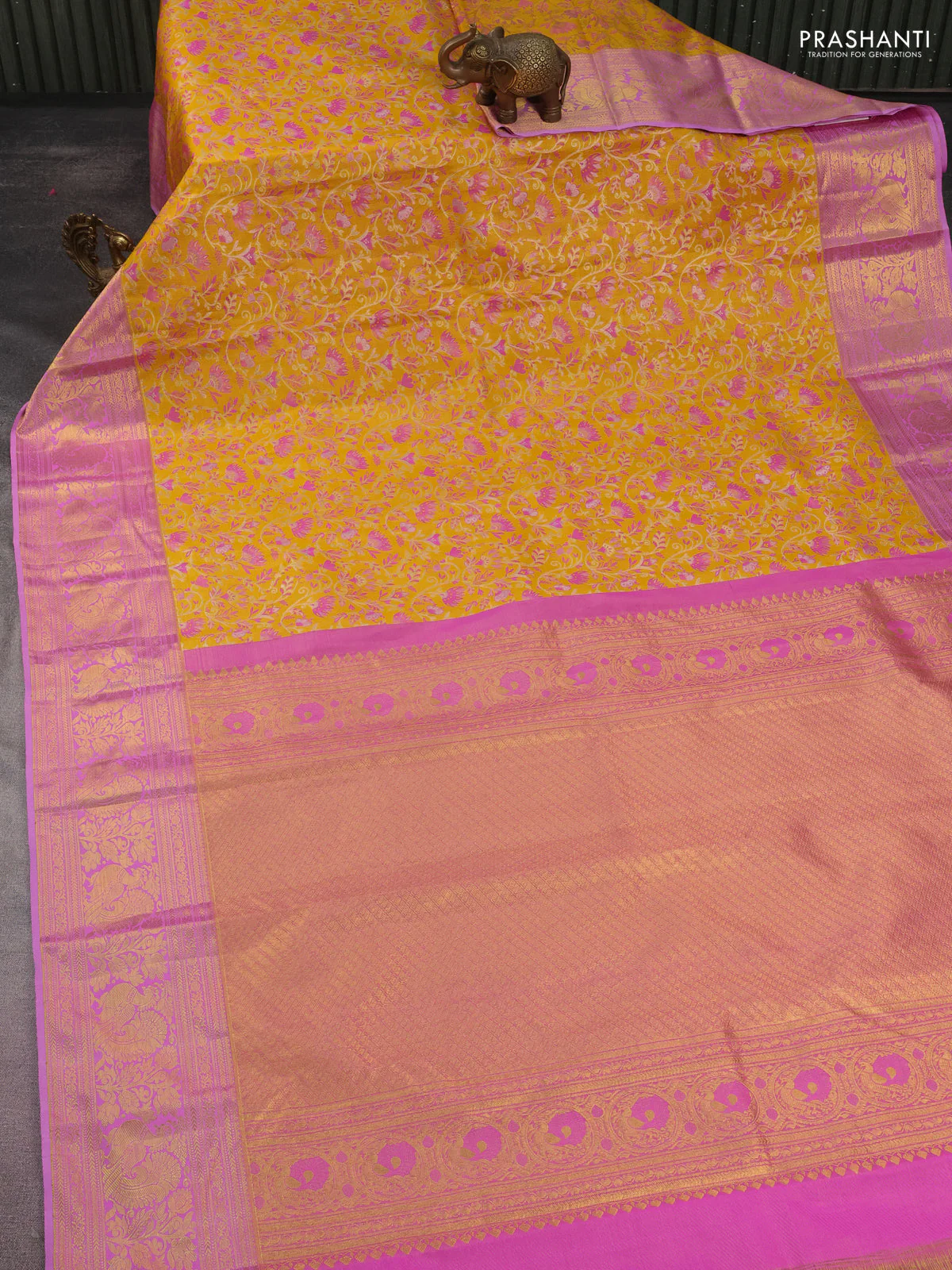 Kanchipuram tissue silk saree yellow and pink with allover zari woven brocade weaves and rich zari woven annam border - Image 2