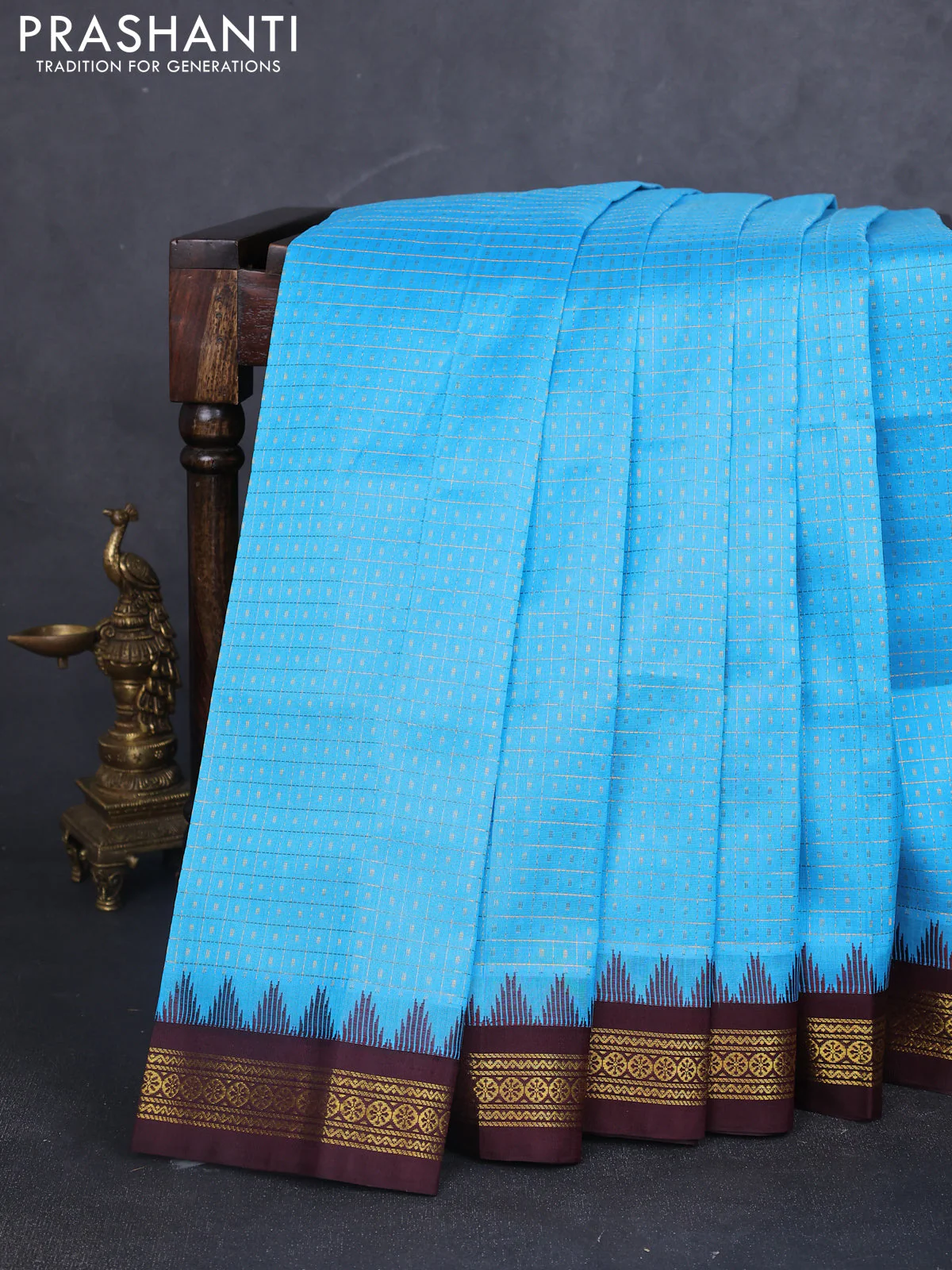 Kuppadam silk cotton saree cs blue and coffee brown with allover zari checks & lakshadeepam weaves and temple design zari woven border