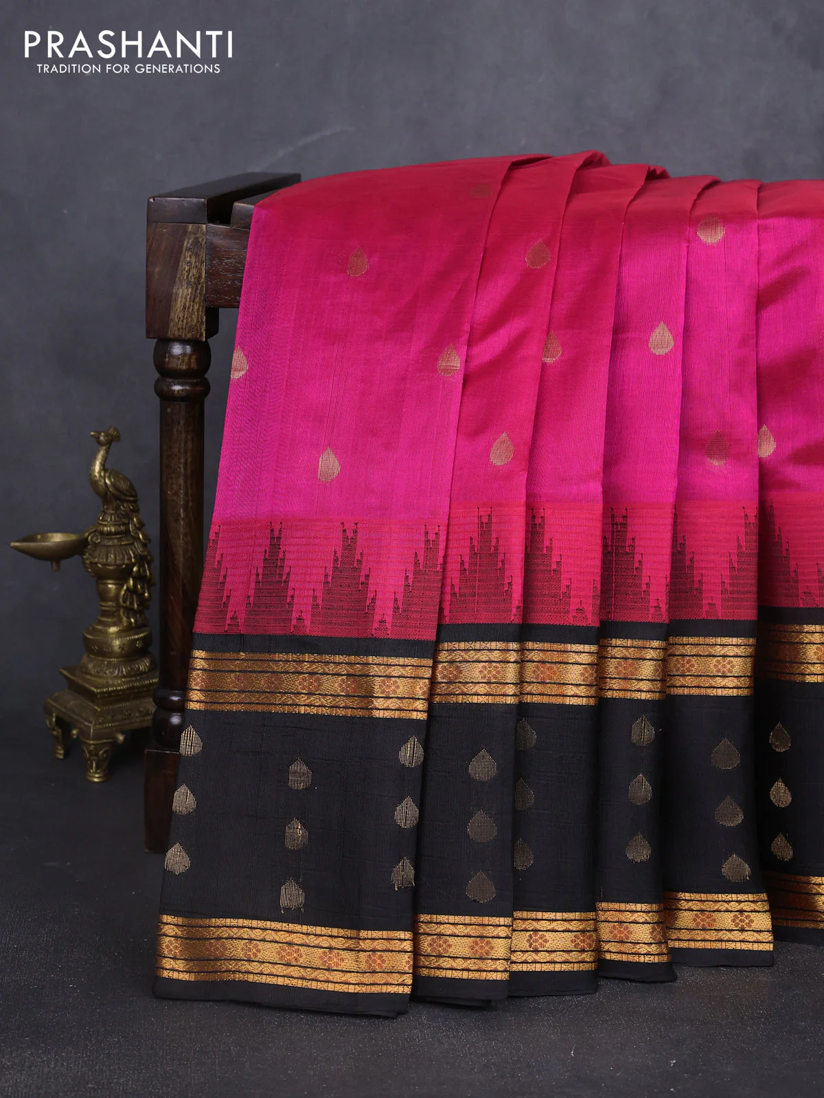 Kuppadam silk cotton saree dark magenta pink and black with allover zari woven buttas and rettapet zari woven butta border
