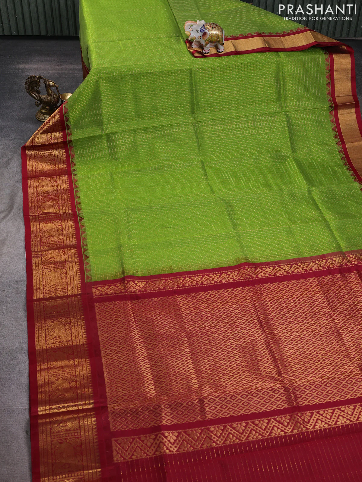 Kuppadam silk cotton saree light green and maroon with allover laksha deepam pattern and temple design elephant zari woven border - Image 2