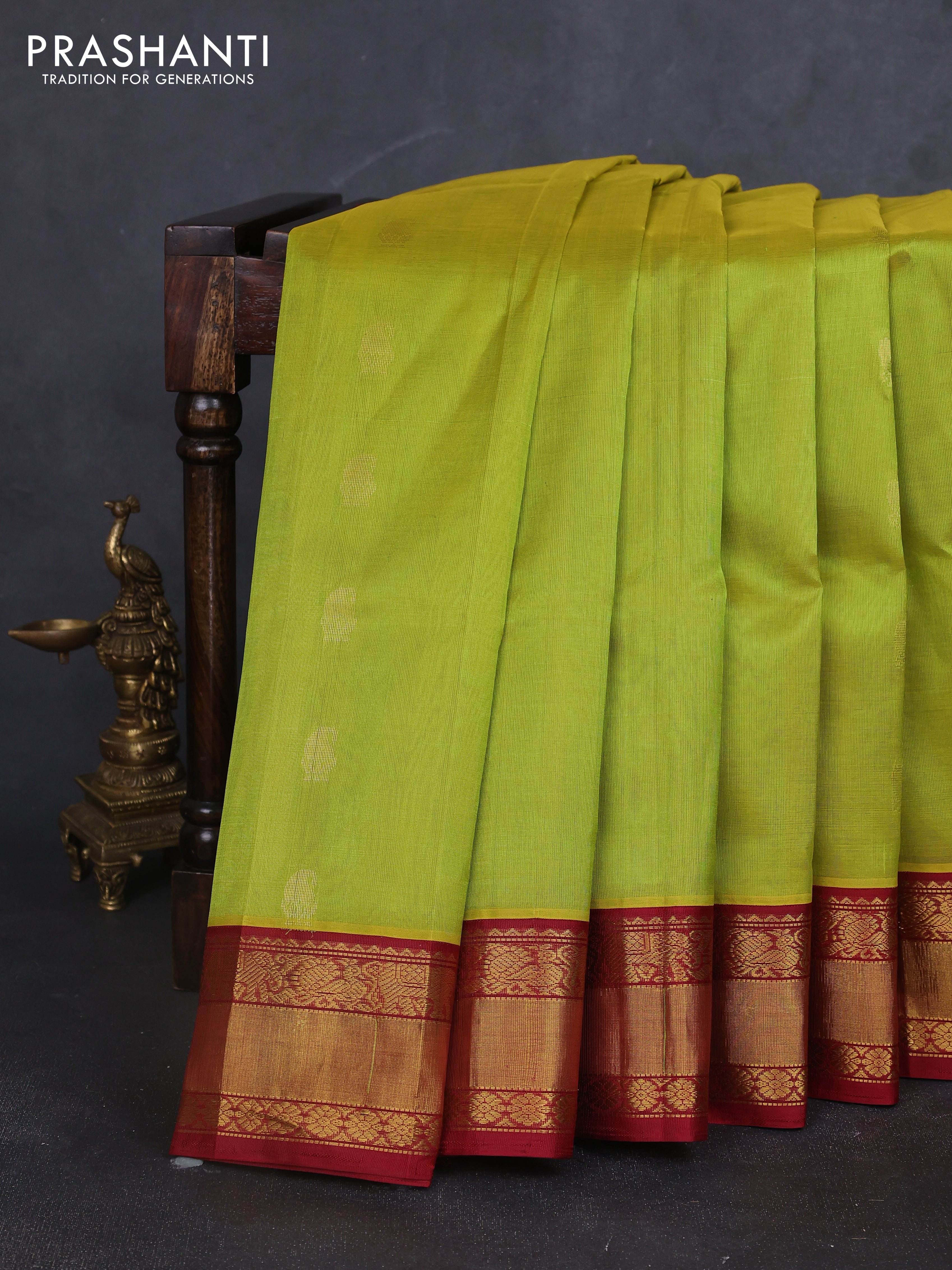 Kuppadam silk cotton saree light green and maroon with annam zari woven buttas and zari woven korvai border