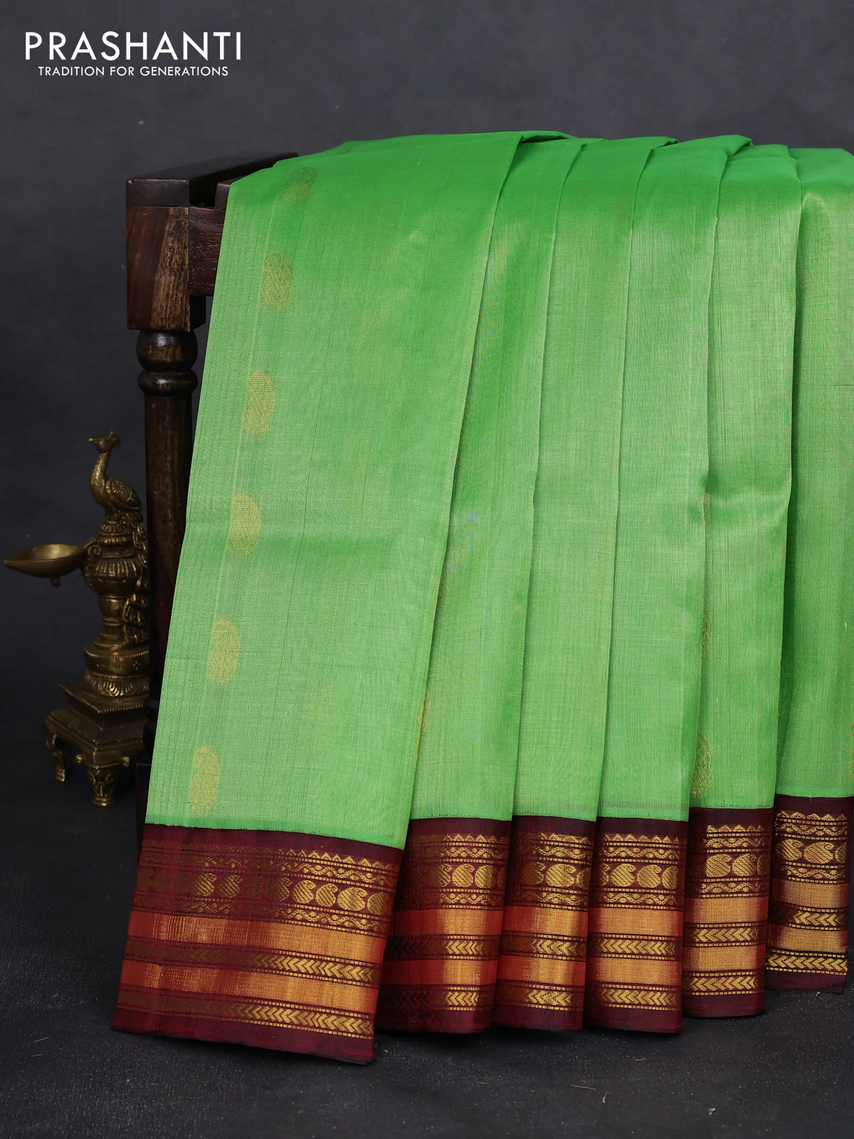 Kuppadam silk cotton saree light green and maroon with zari woven buttas and zari woven border