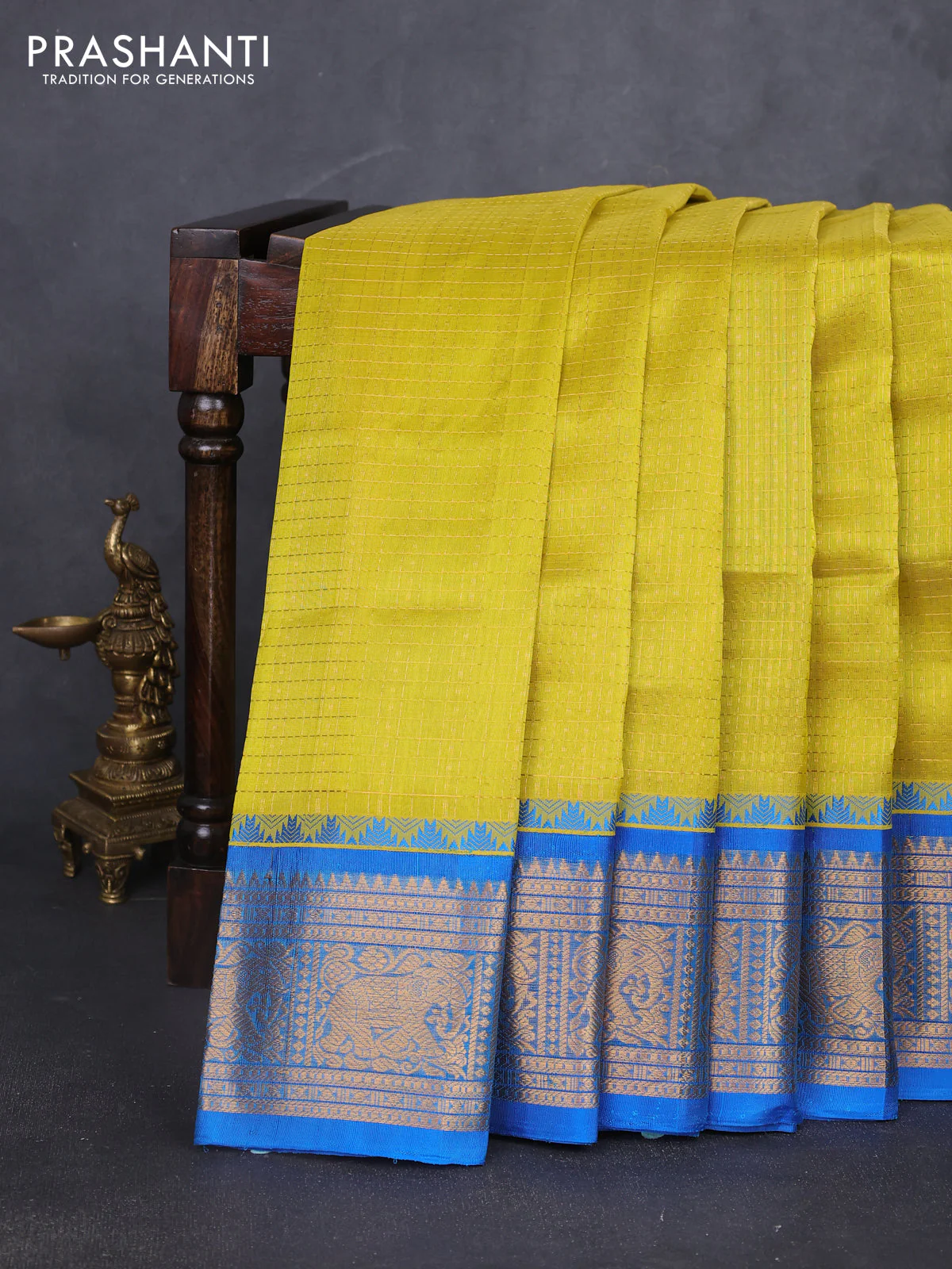 Kuppadam silk cotton saree lime yellow and cs blue with allover laksha deepam pattern and temple design elephant zari woven border