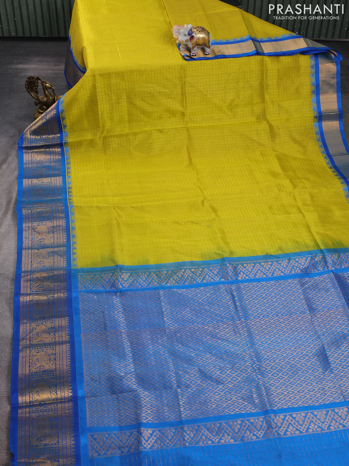 Kuppadam silk cotton saree lime yellow and cs blue with allover laksha deepam pattern and temple design elephant zari woven border - Image 2
