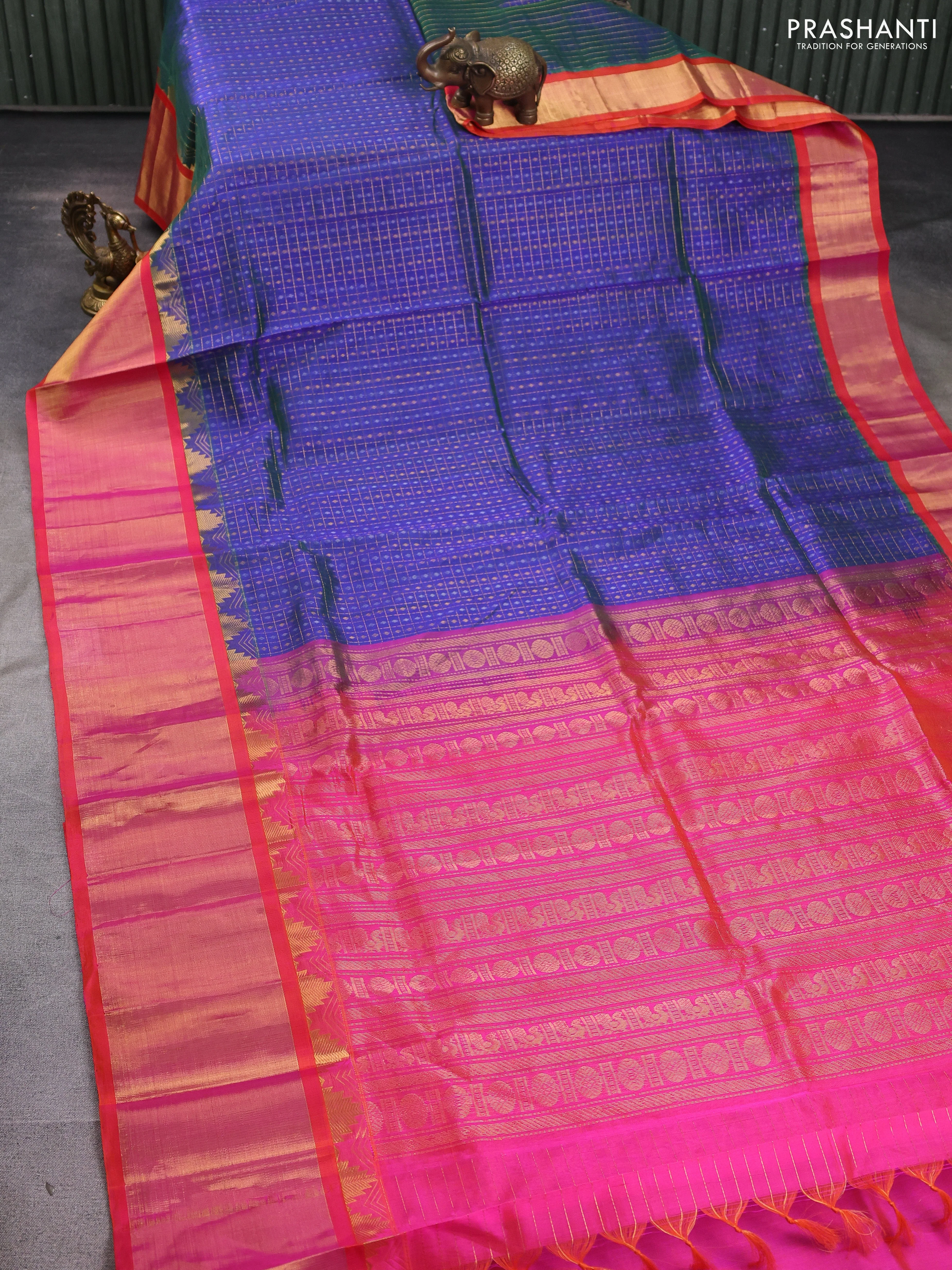 Kuppadam silk cotton saree navy blue and orange with allover zari checks & lakshadeepam weaves and temple design long zari border - Image 2