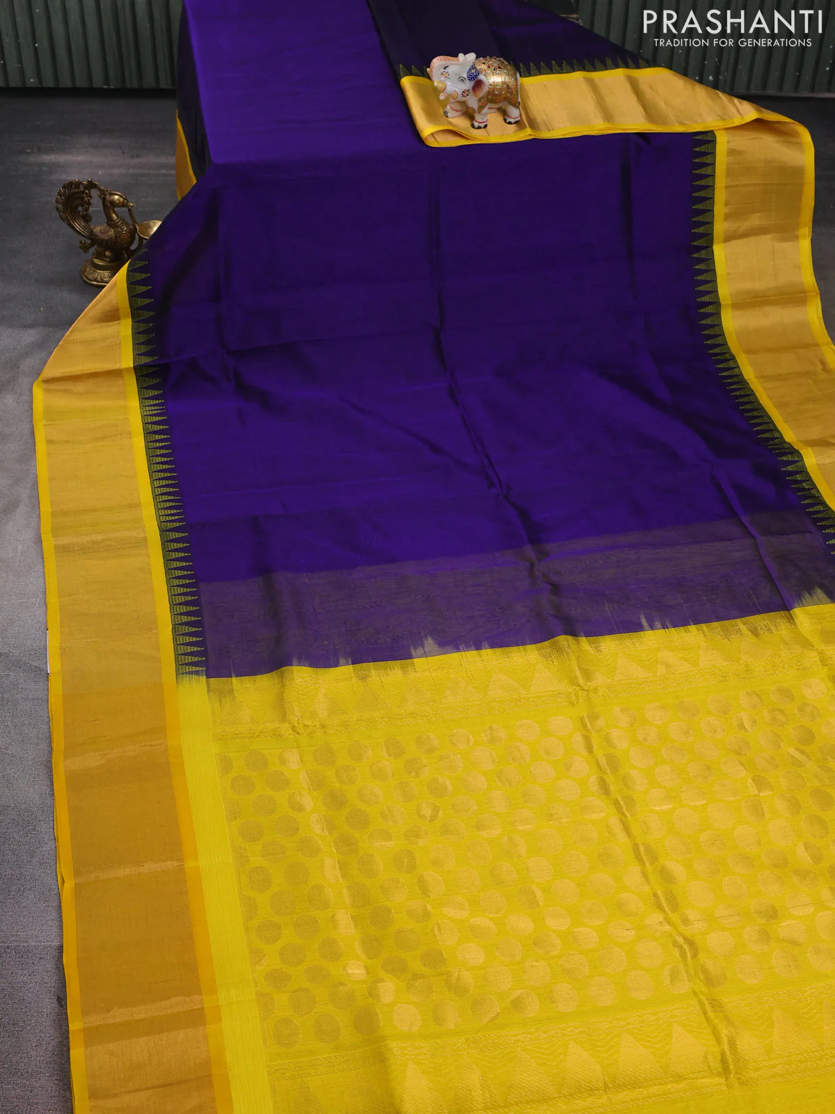 Kuppadam silk cotton saree navy blue and yellow with plain body and temple design zari woven border - Image 2