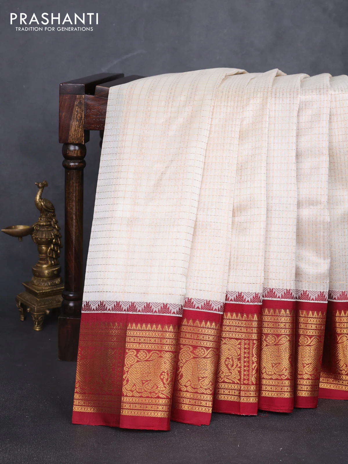 Kuppadam silk cotton saree off white and maroon with allover laksha deepam pattern and temple design elephant zari woven border