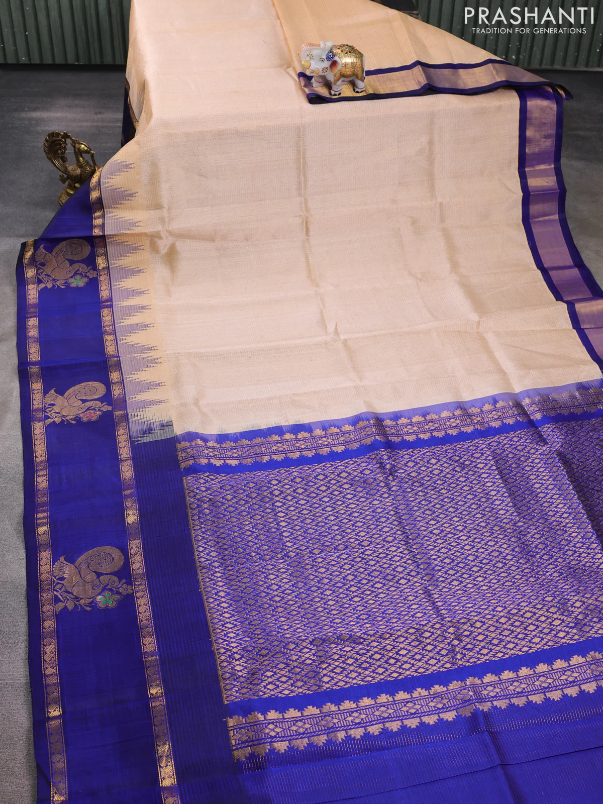 Kuppadam silk cotton saree sandal and blue with allover small zari checked pattern and long temple design zari woven border - Image 2