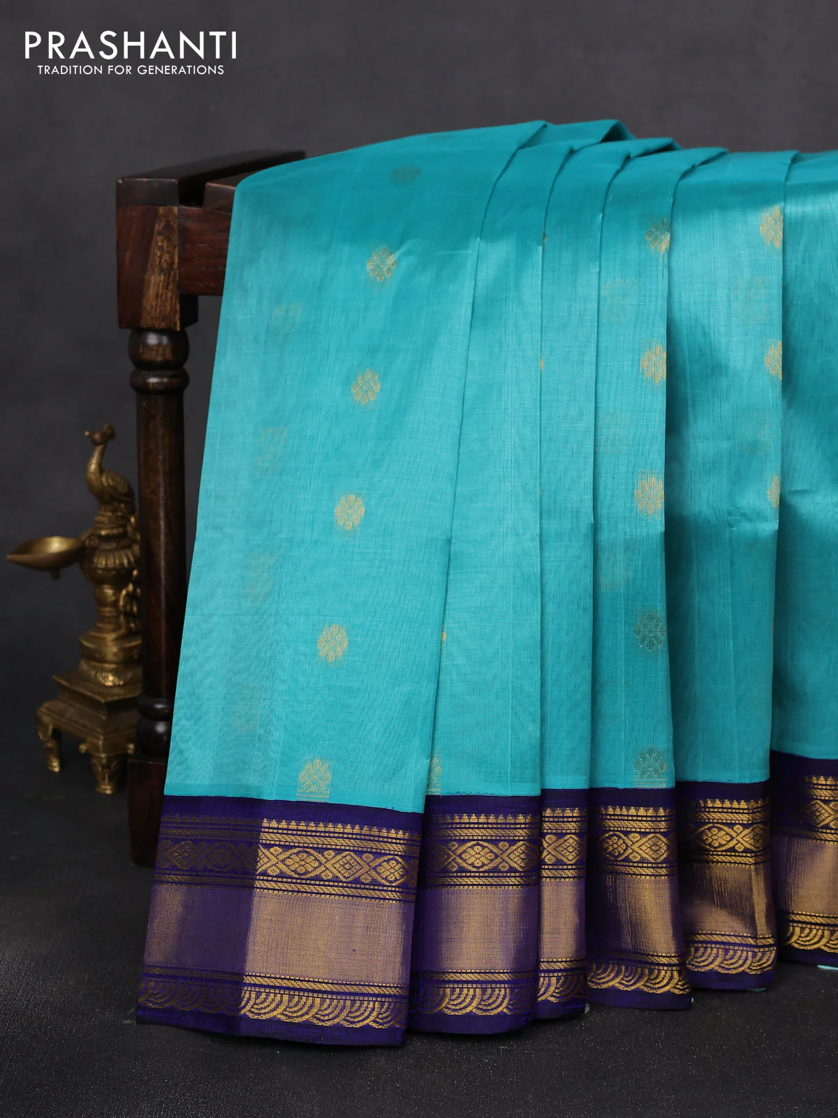Kuppadam silk cotton saree teal blue and blue with zari woven buttas and zari woven border