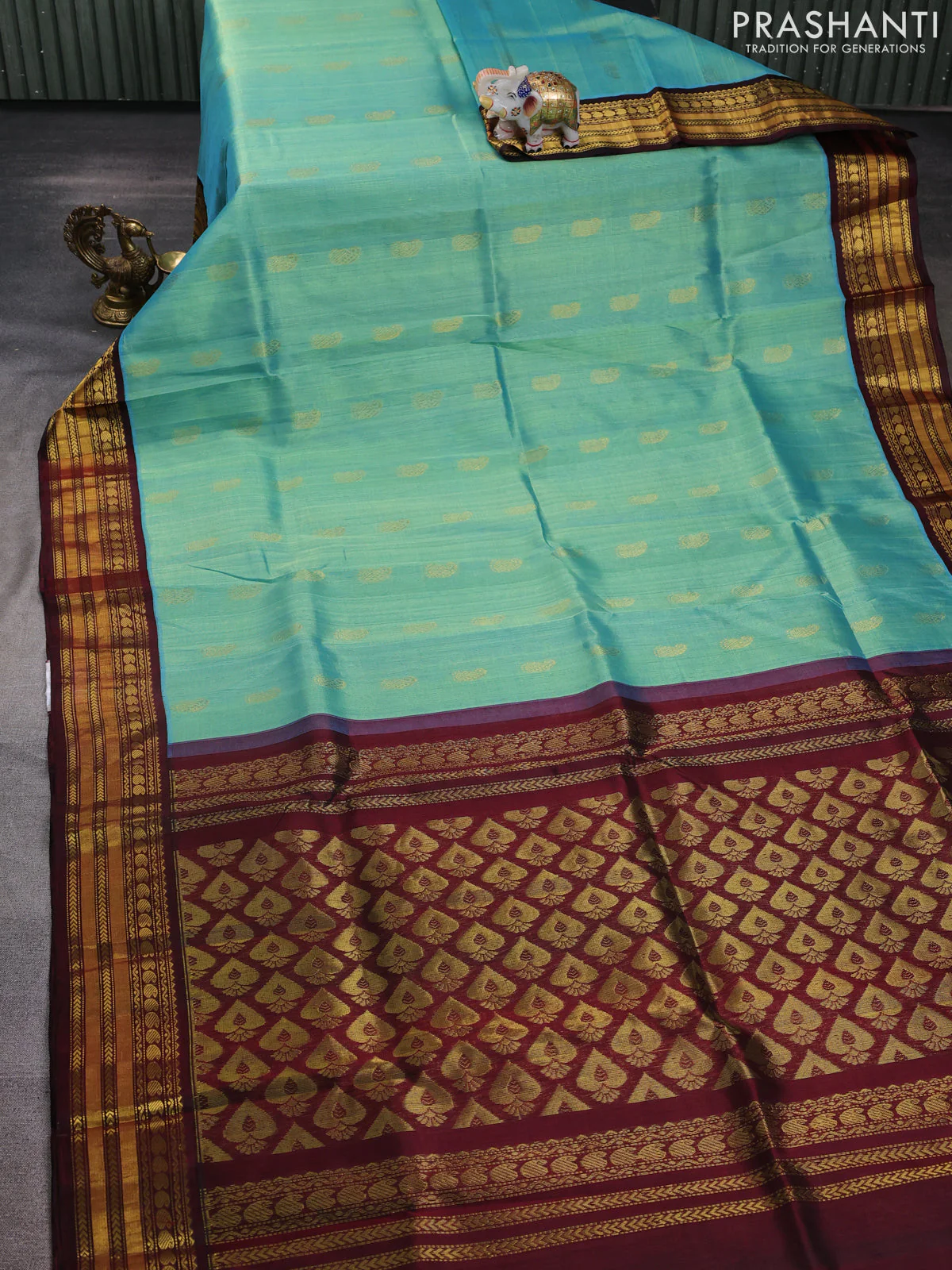 Kuppadam silk cotton saree teal blue and deep maroon with allover paisely zari woven buttas and temple design zari woven border - Image 2