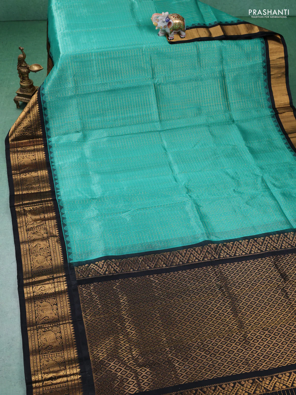 Kuppadam silk cotton saree teal green and black with allover zari checks & lakshadeepam weaves and zari woven border - Image 2
