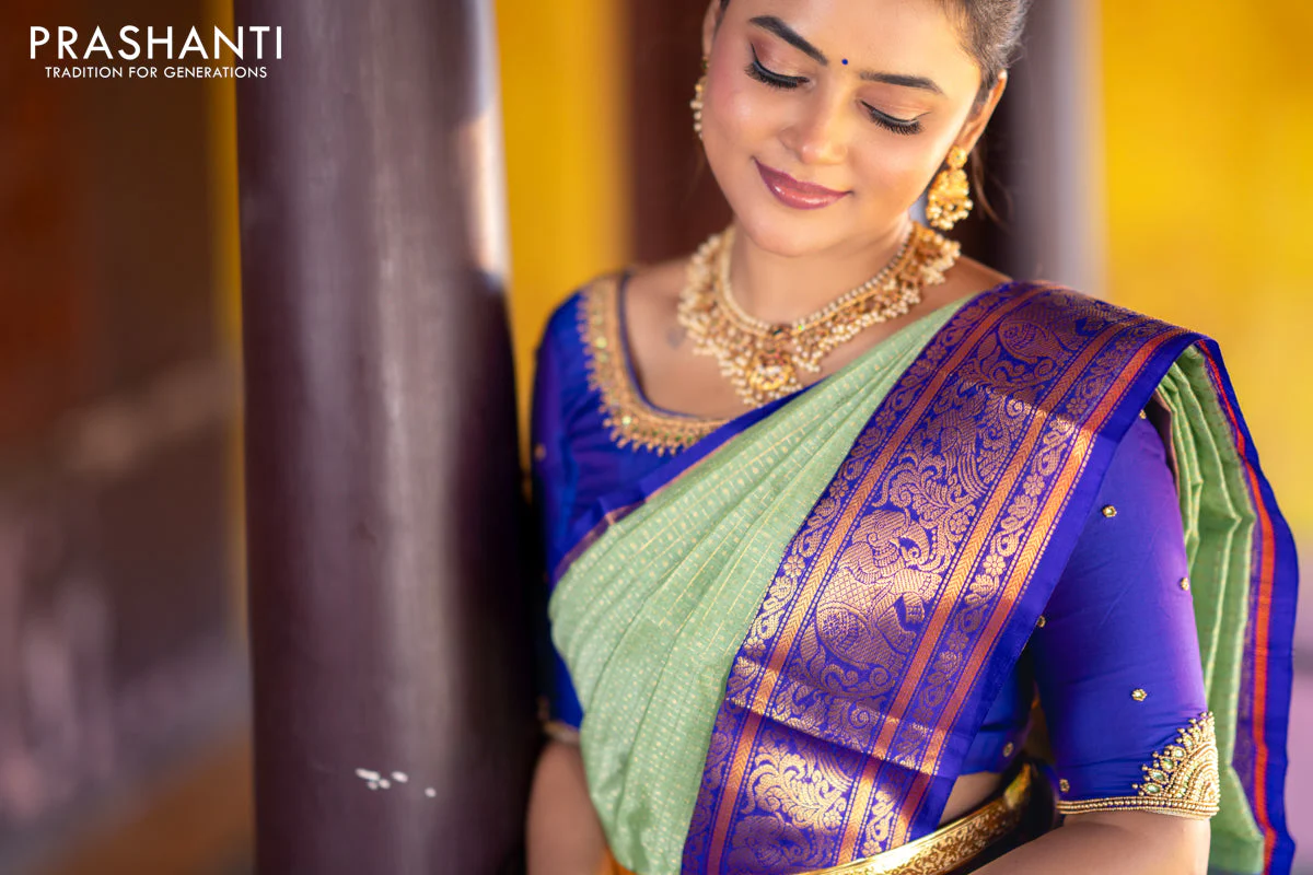 Kuppadam silk cotton saree teal green and blue with allover zari checks & buttas and temple deisgn zari woven border - Image 5