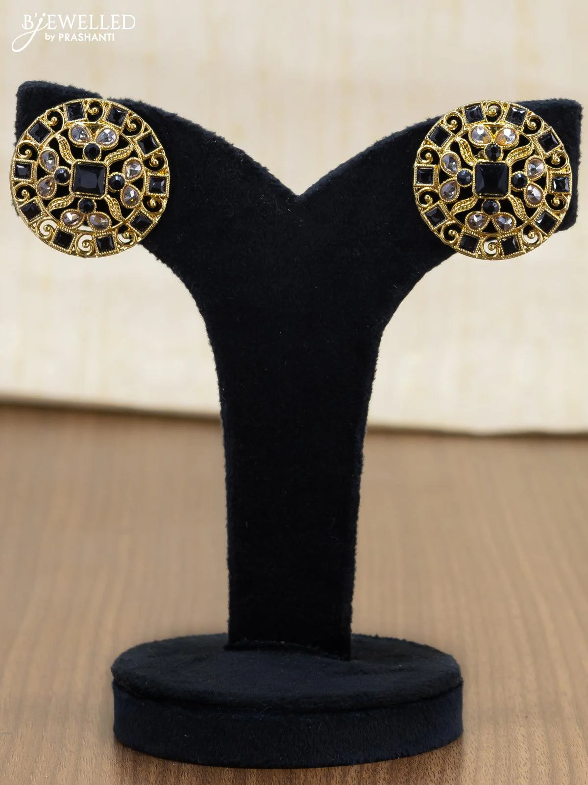 Light weight floral design earrings with cz and black stone - Image 2