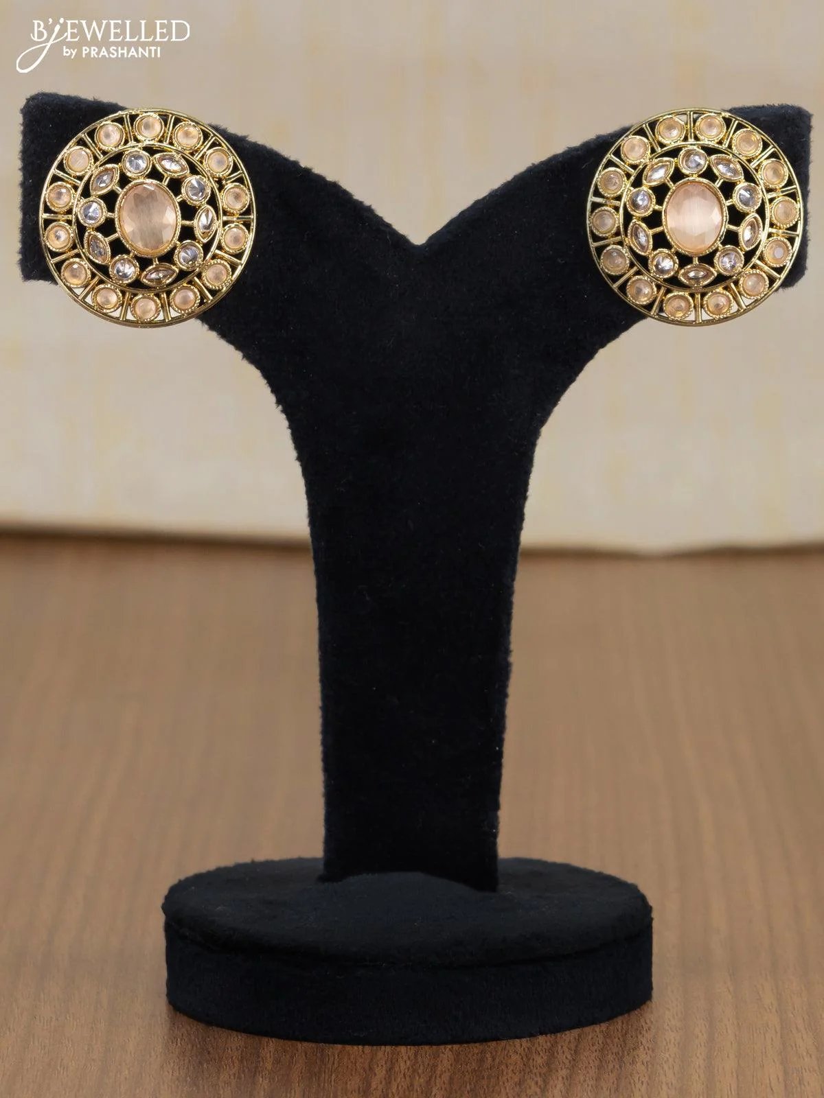 Light weight floral design earrings with peach stones in gold finish - Image 3
