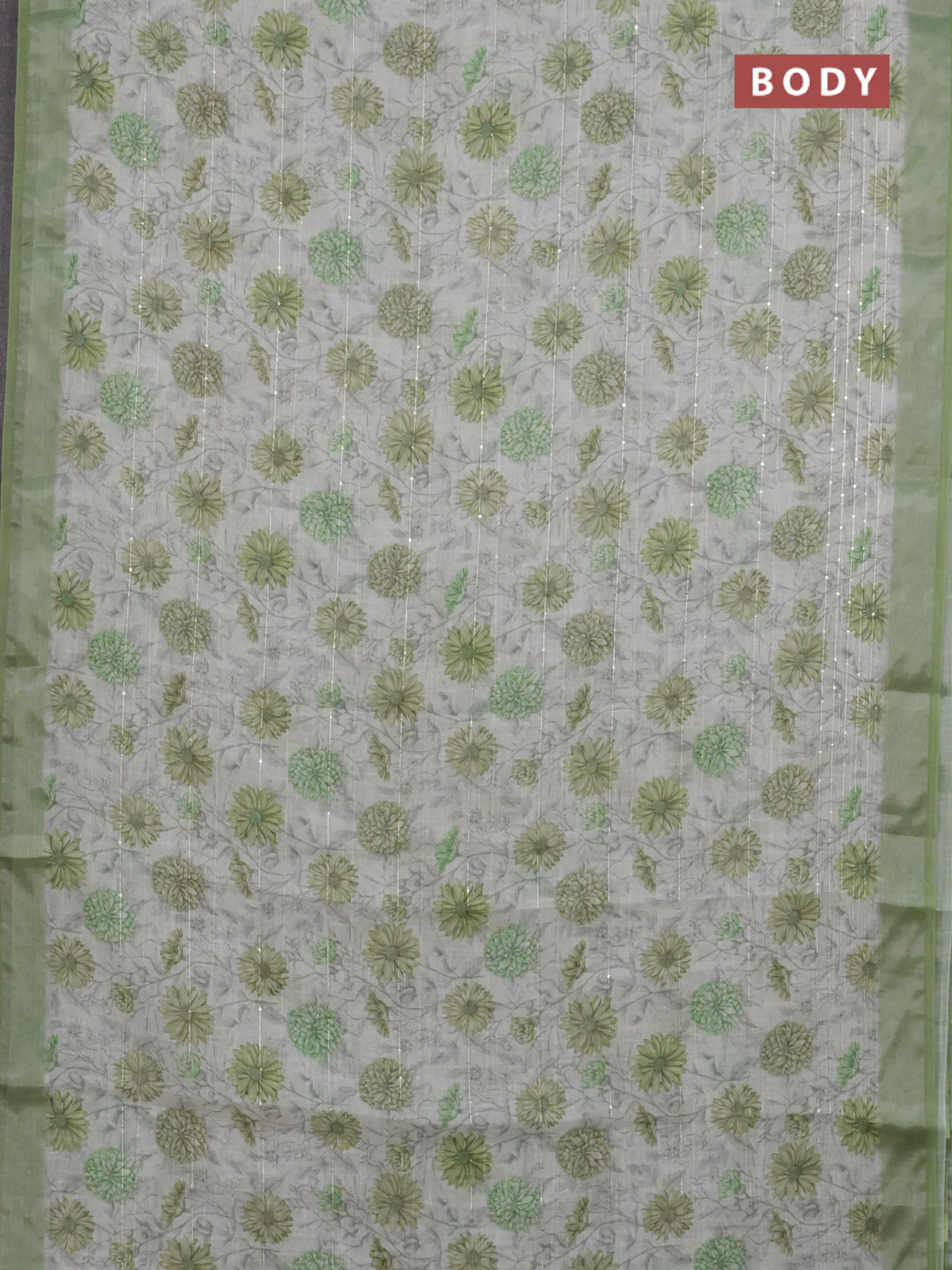 Linen cotton saree cream and green with allover floral prints & sequin work and silver zari woven border - Image 2