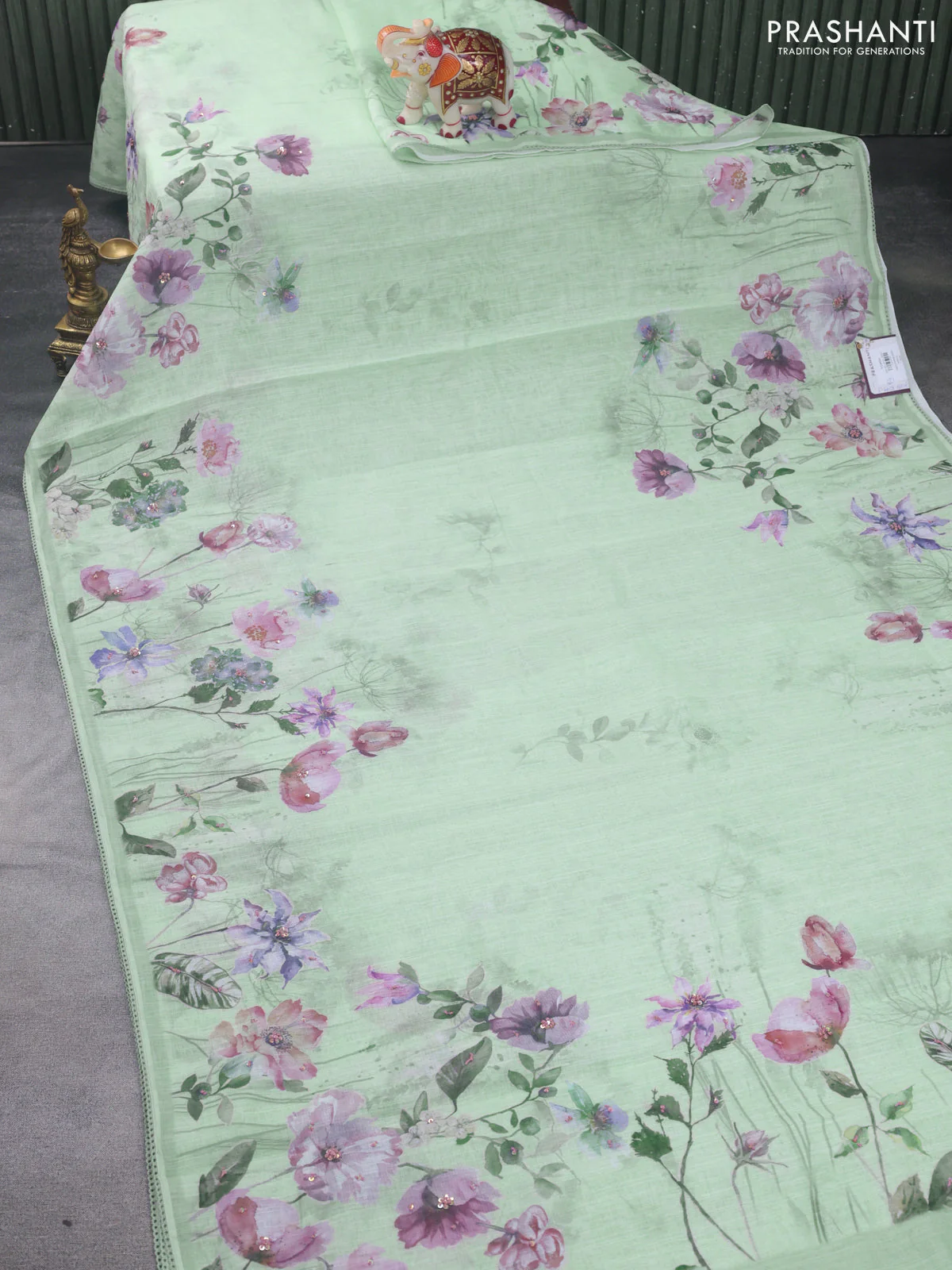 Linen cotton saree pastel green with plain body and floral prints & french knot work - Image 2